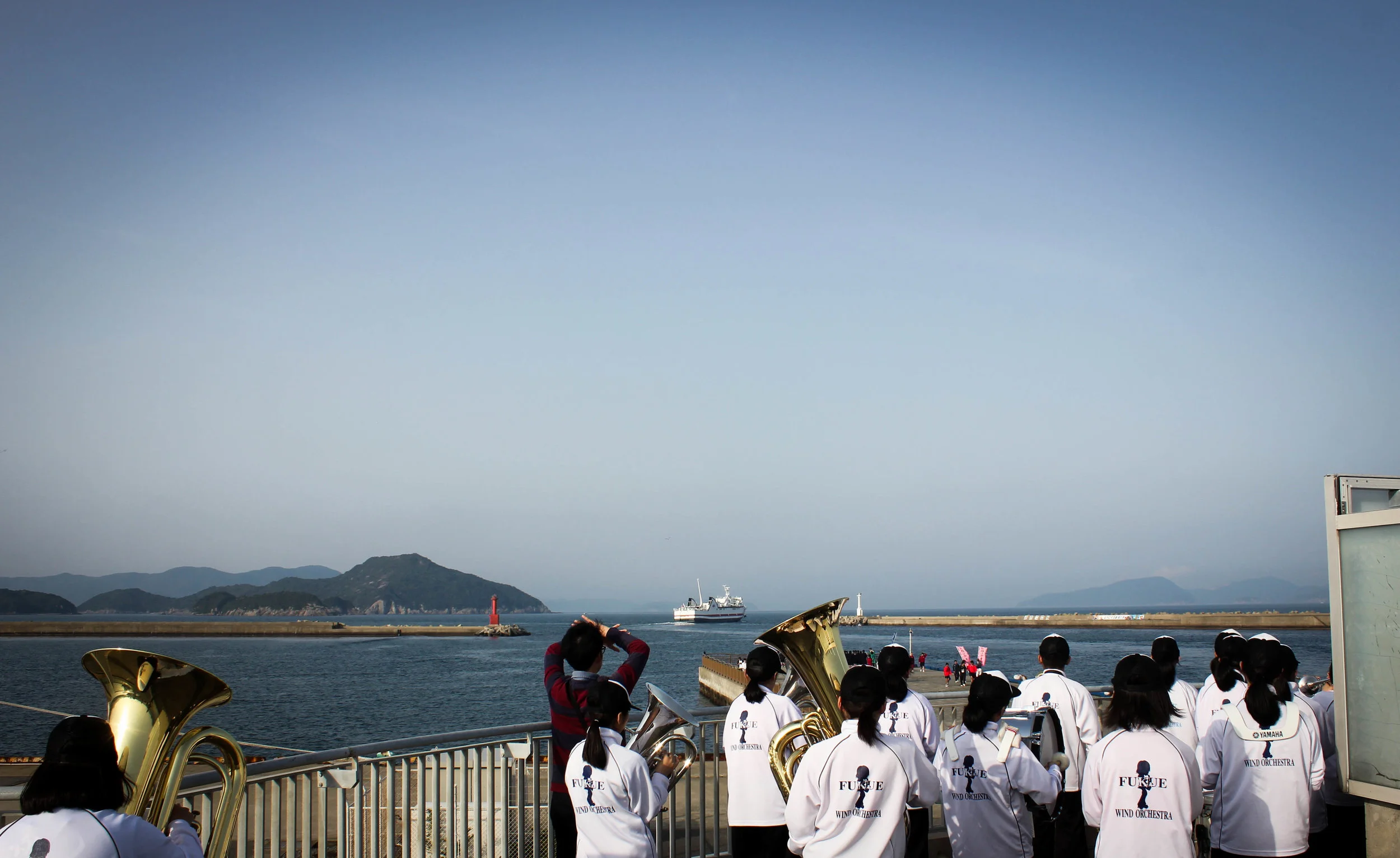The Fukue Junior High School band set up on top of a lookout point and playing the ferry out until it is out of sight. I stood behind, silently weeping lol. 