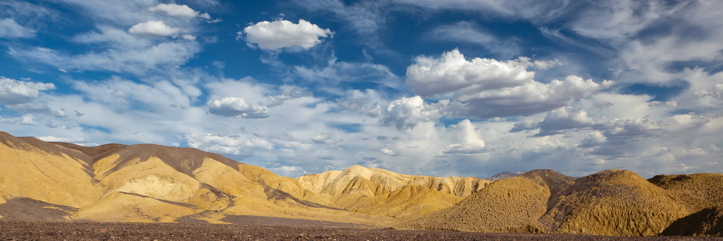 Golden Hills and Clouds - Death Valley