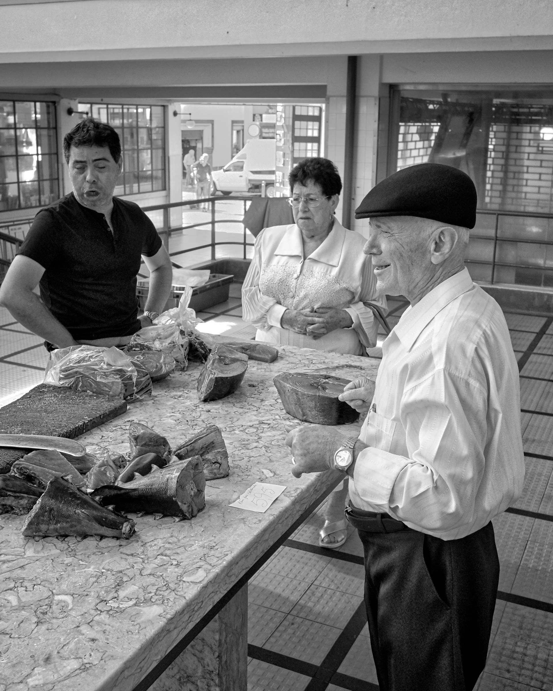Customer buying fish.