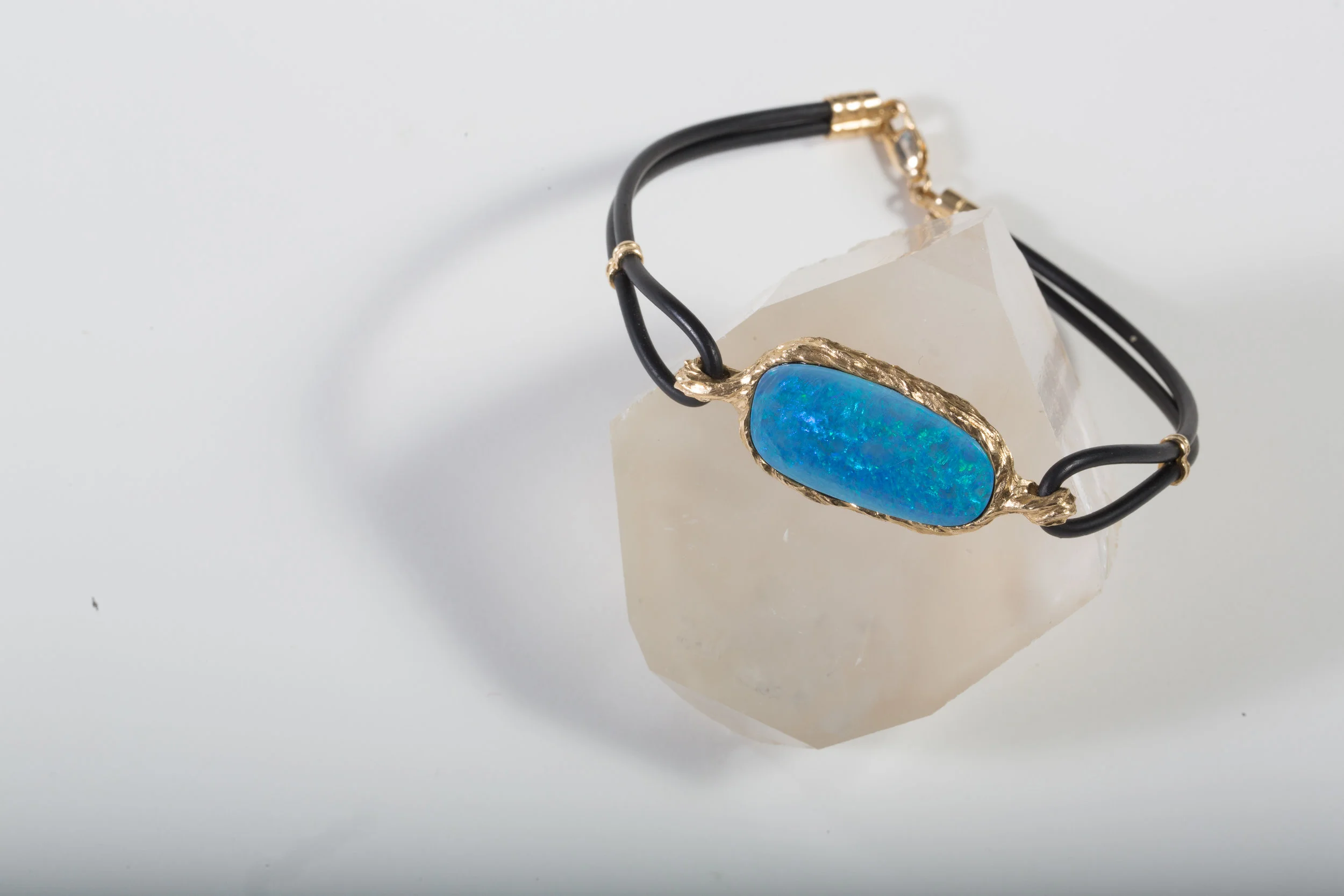 Opal in Textured 14k Yellow Gold Frame on Neoprene Cord $1,975