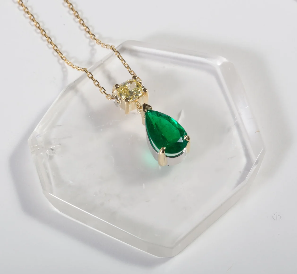 Pear Shaped 1.95ct Emerald and .58ct Yellow Diamond Pendant set in 18k Yellow Gold and Platinum $15,900