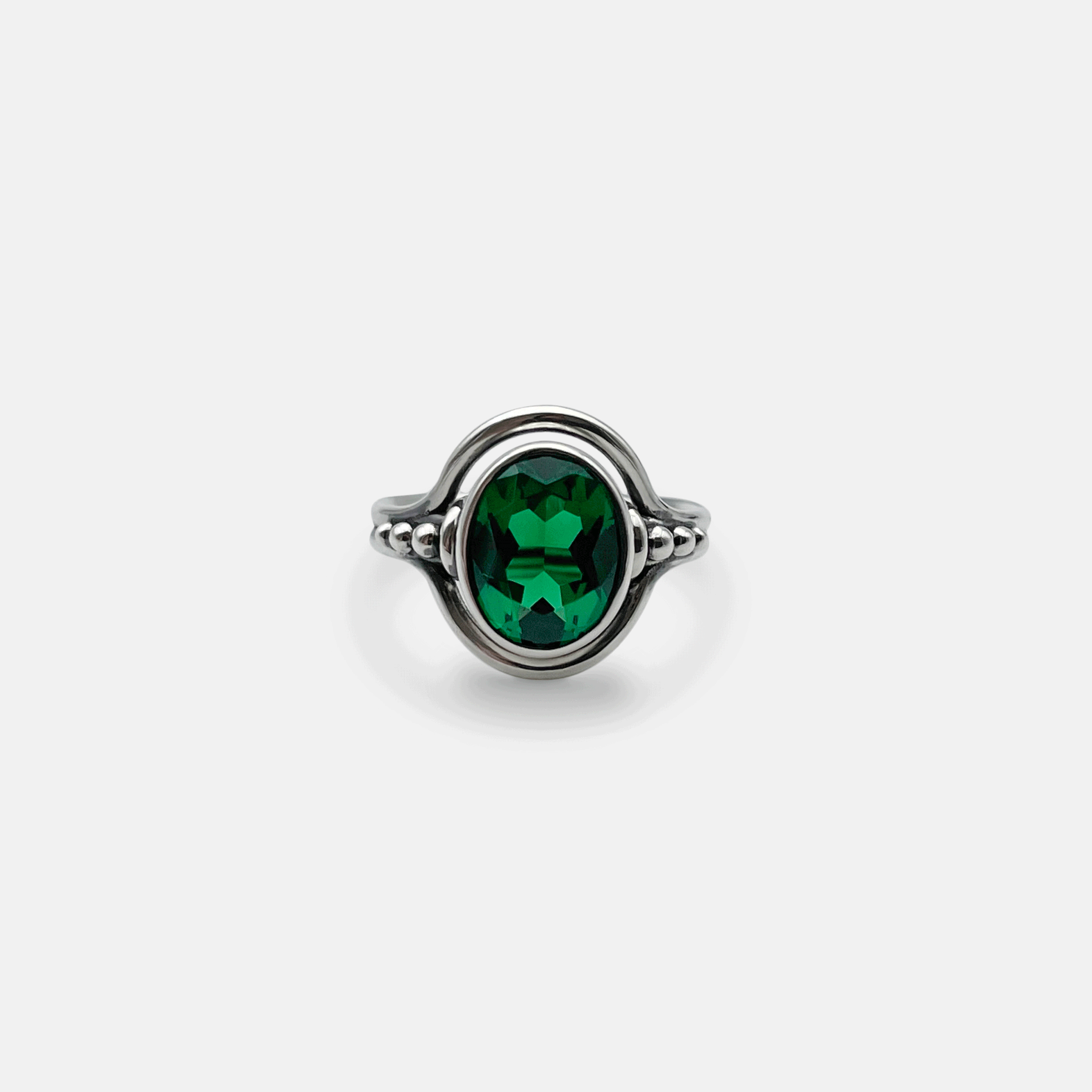 engagement ring with emerald stone