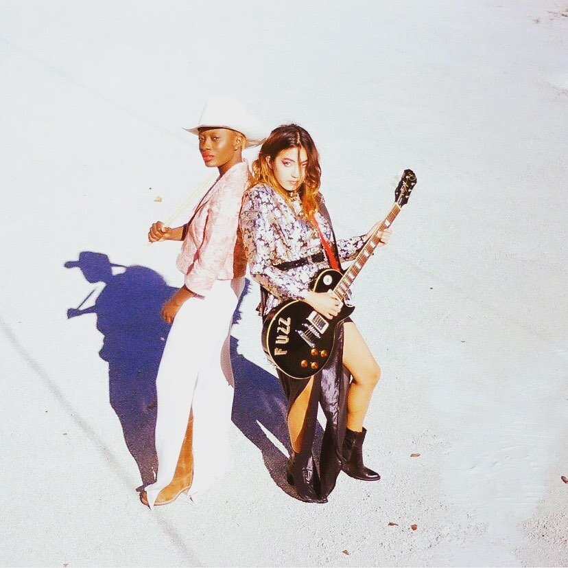Flashback Friday with these mega babes! Bring on the weekend! We&rsquo;re open! Photo by @liammilano on 35mm Nikon F3, we also are a source for vintage working cameras and film in addition to our vintage fashion, records, and video games. #neverknoww