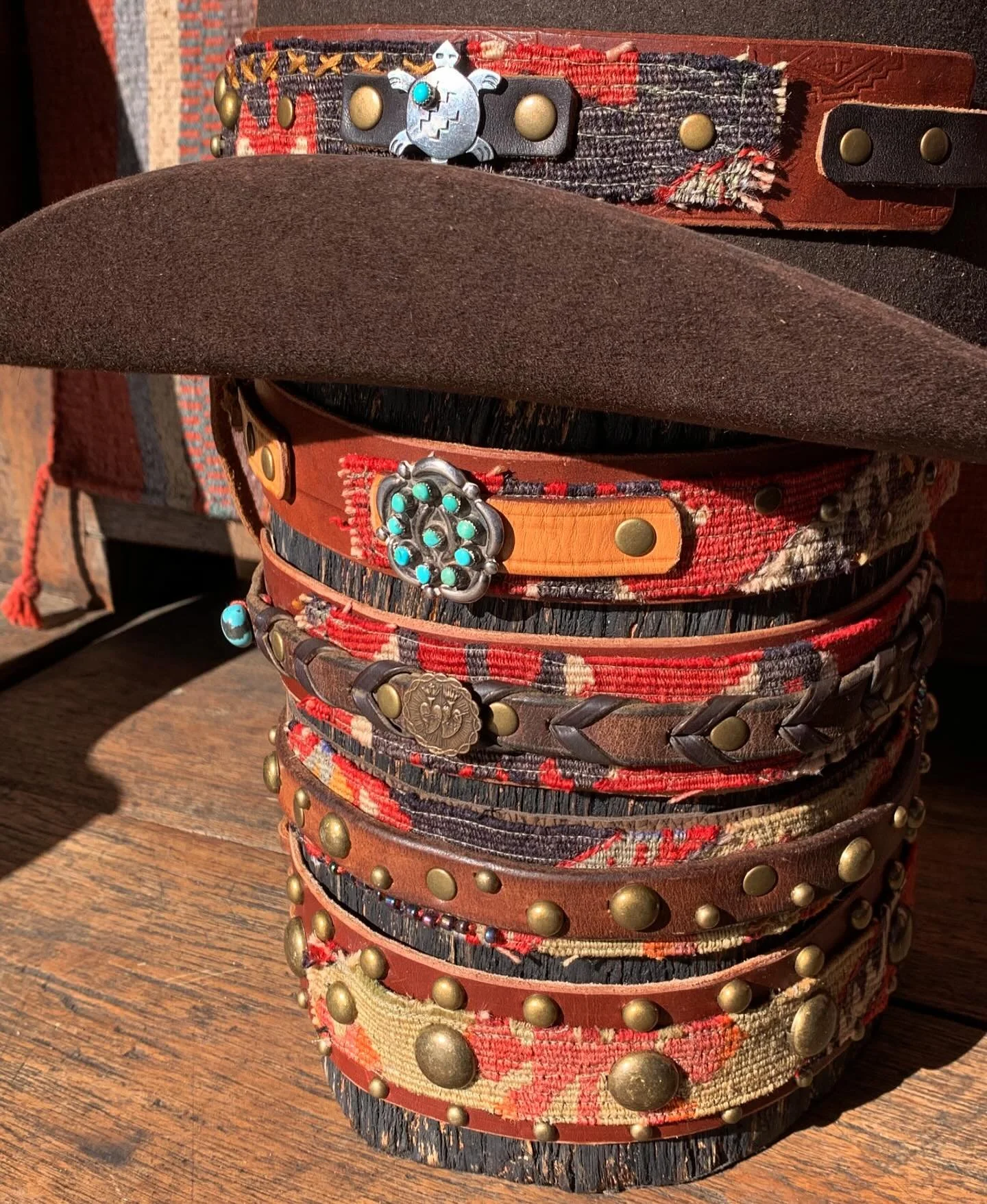 Vintage Southwest pins add a pop of contrast on these Turkish Kilim and vintage horse tack hatbands! Coming soon to @canyon_contemporary