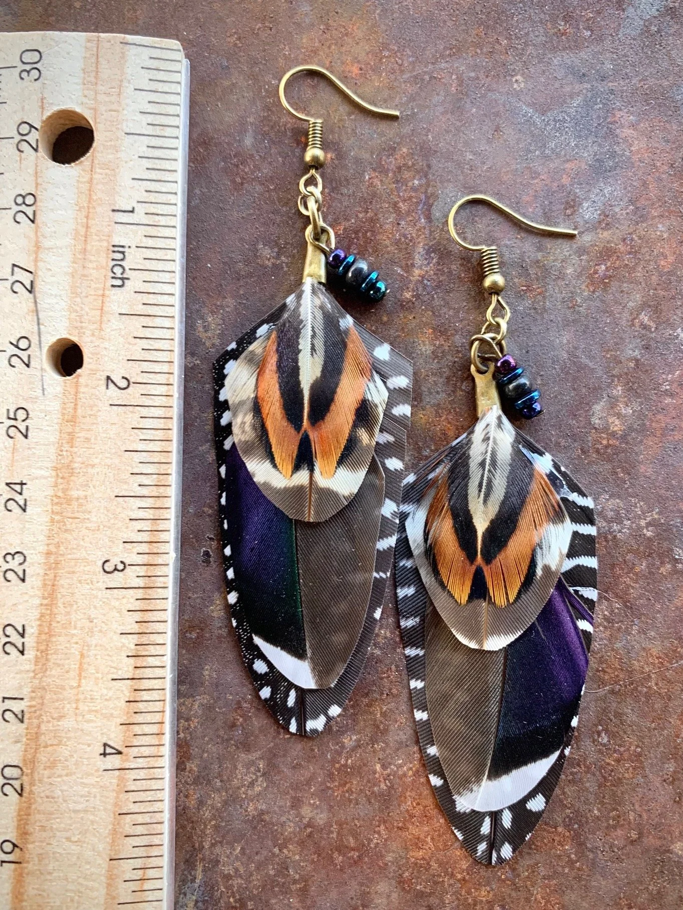Duck Feather Earrings with Ruler.jpg