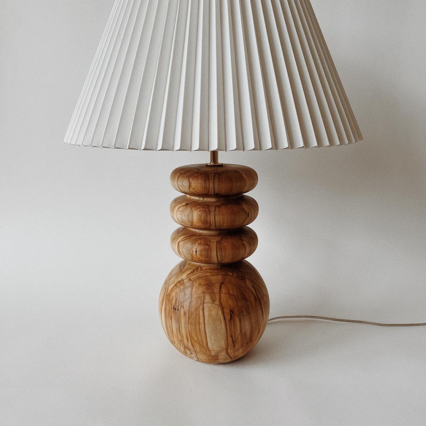 Bring warmth &amp; light into your home with a handcrafted table lamp; a few more left in the shop💡

.
.
.
.
.
.
.
.
#lighting #tablelamps #homelighting #lightingdesign #lights #tablelamp #design #wood #woodworking #homedecor #homedesign