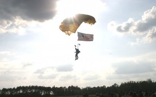 Landing the national colors during a memorial tribute to SFC (retired) Paul Rafferty