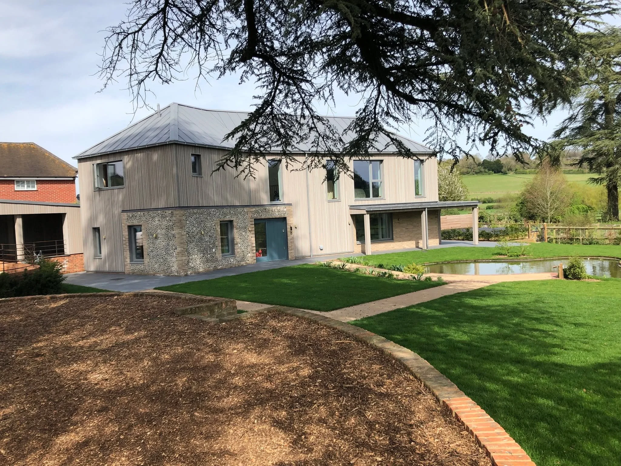 A Passivhaus-certified home that demonstrates how contemporary architecture and sustainability can work hand in hand.

Natural materials, thoughtful detailing and exceptional energy performance create a home that sits comfortably within its countrysi