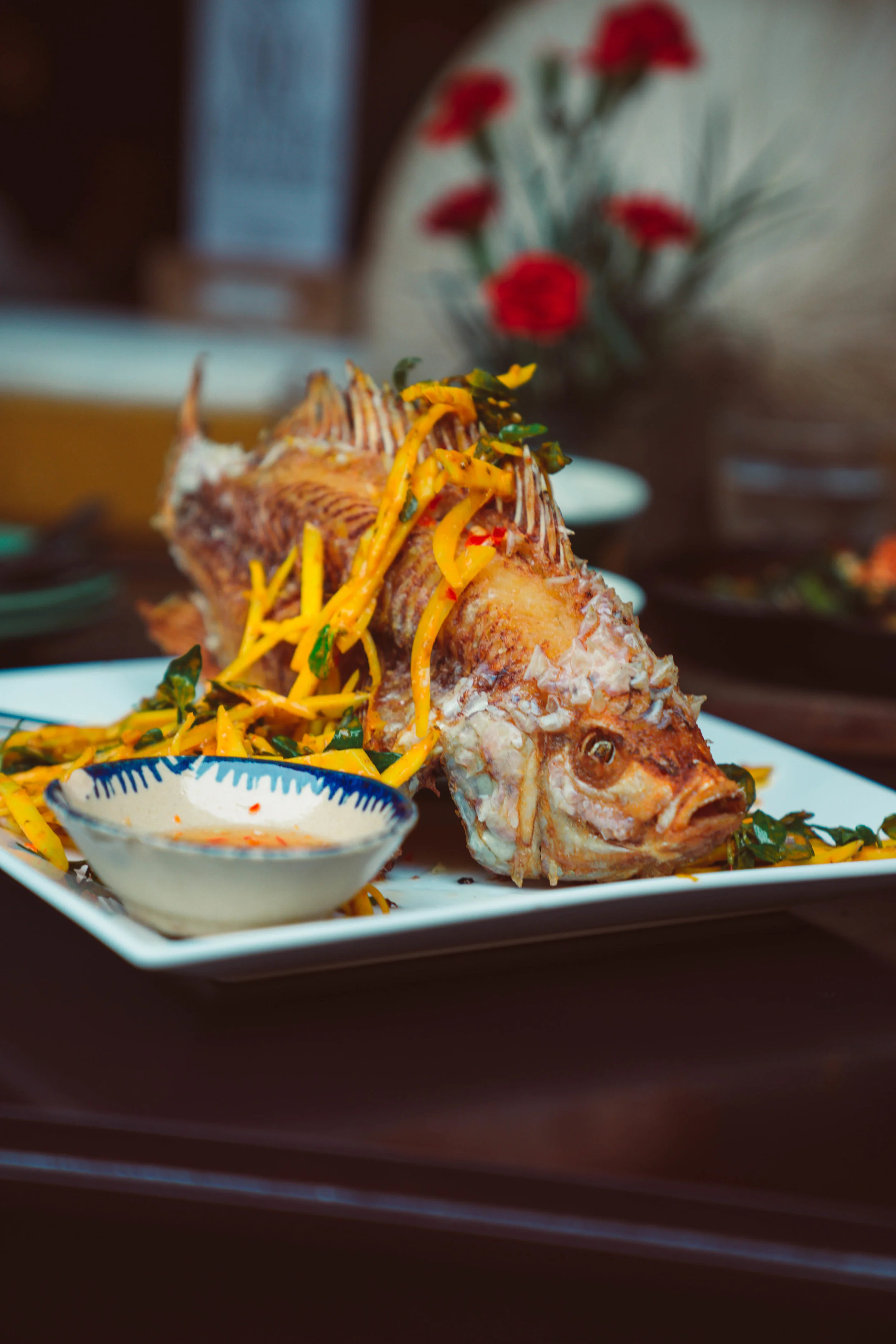 Deep fried elephant ear fish with mango and papaya salad from Morning Glory, Hoi An