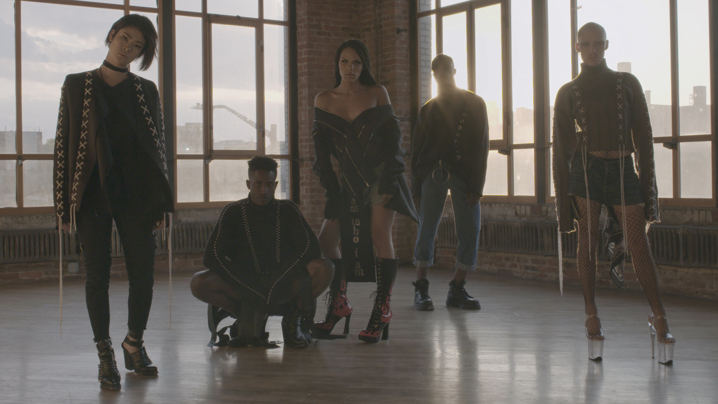 Still frame grab of a group shot from the video