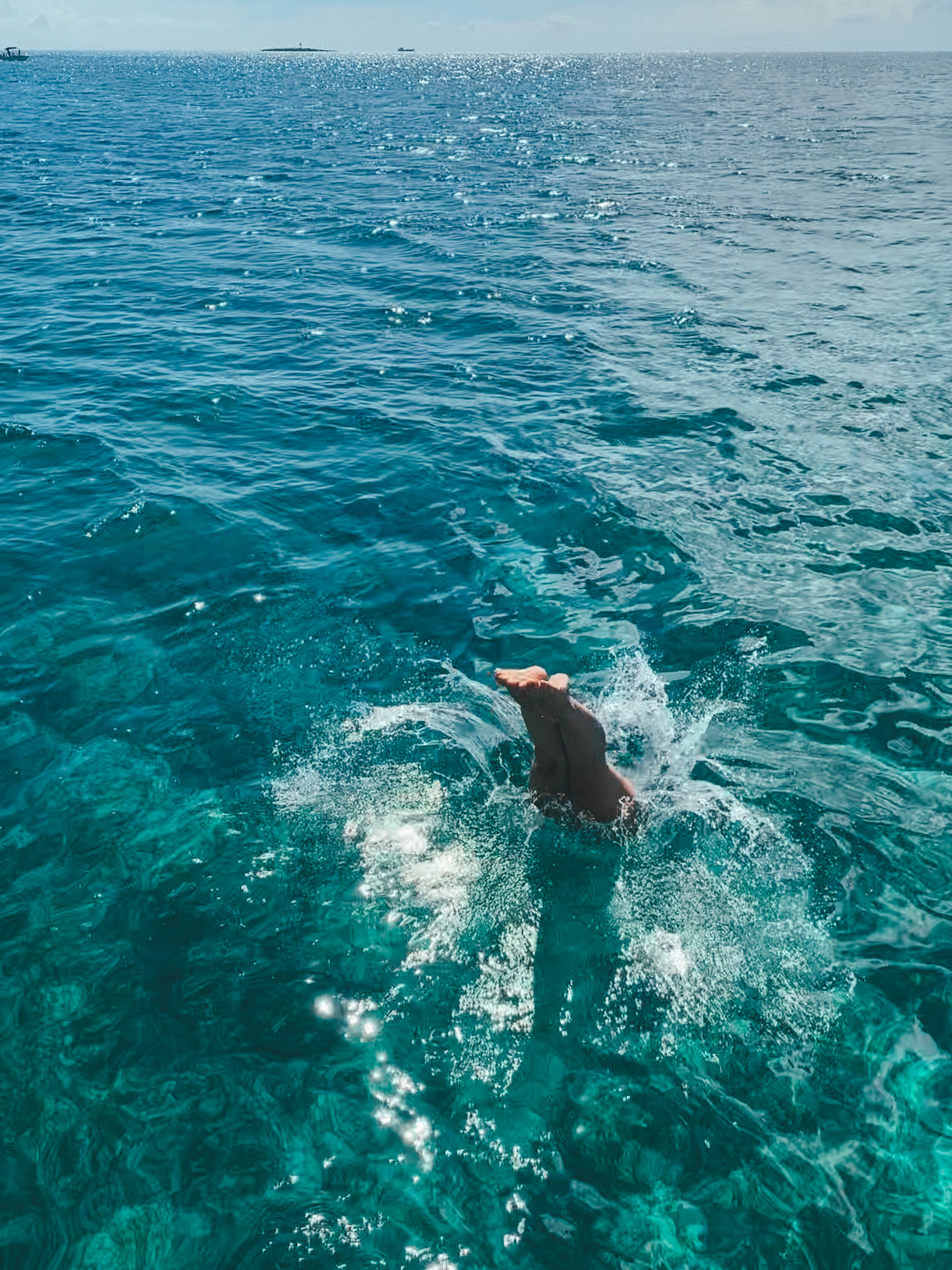  Diving into the blue in the Bahamas. 
