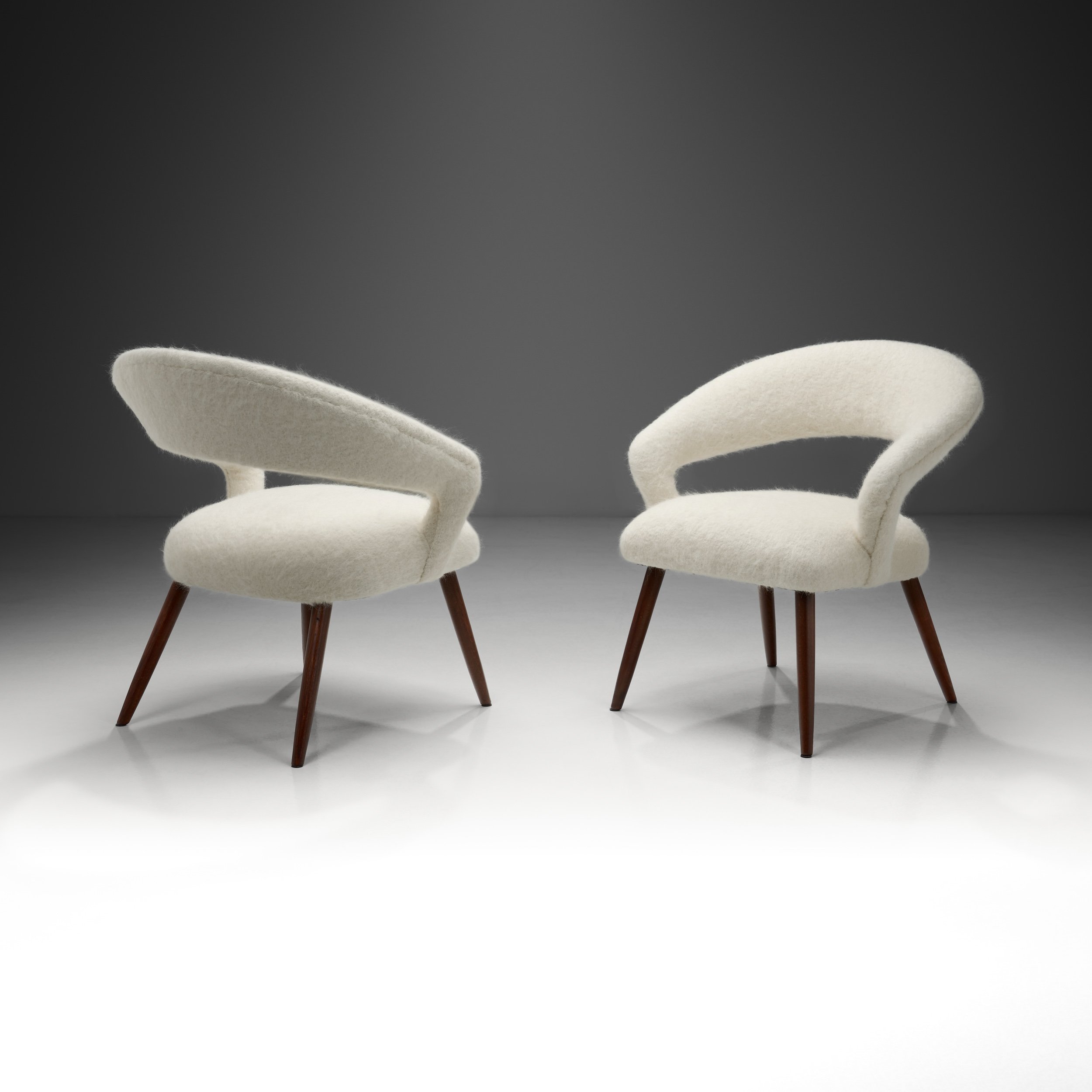 A Pair of Oak Cocktail Chairs, Europe 1950s