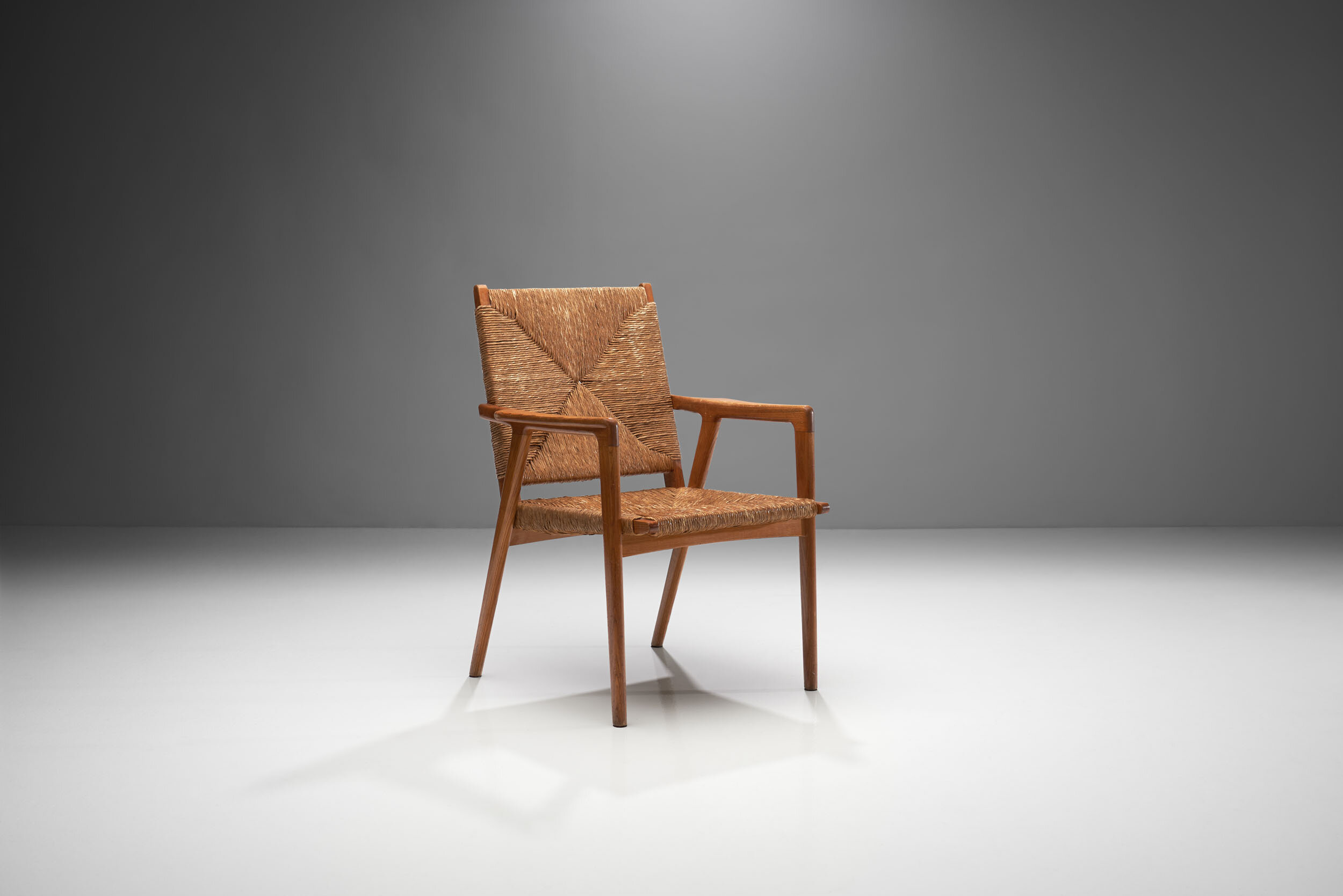 Armchair in Solid Oak and Cane,  Denmark ca 1960s (sold)