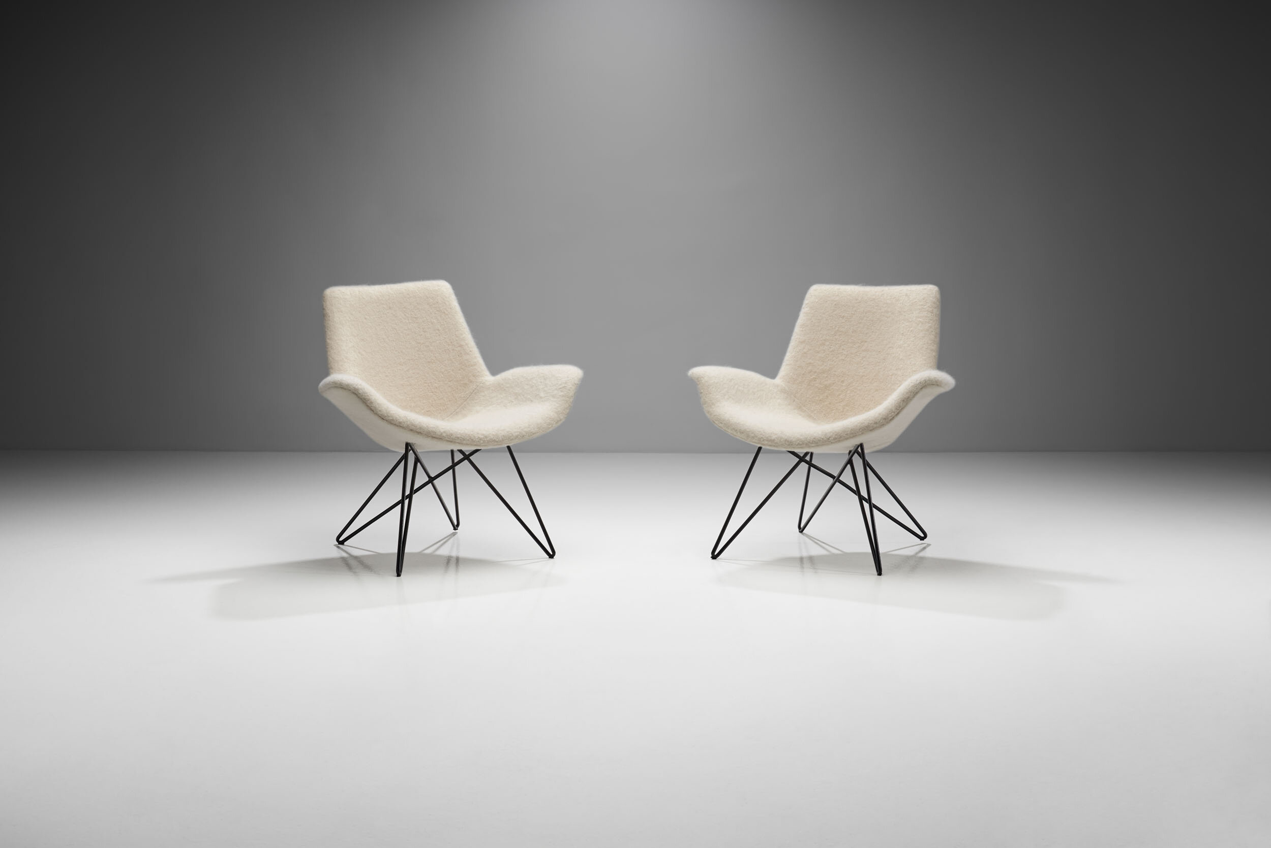 A Pair of Mid-Century Modern Lounge Chairs, Europe 1950s (sold)