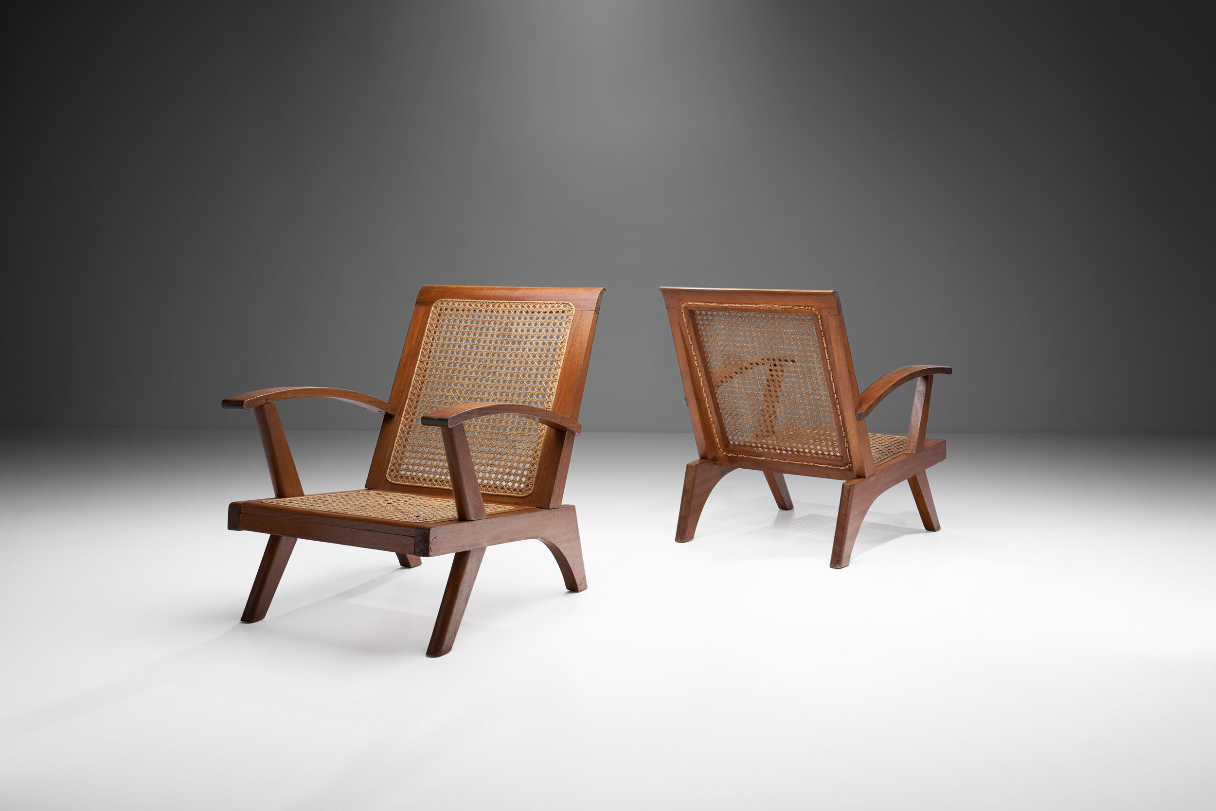 A Pair of French Teak Armchairs, France 1950s (sold)