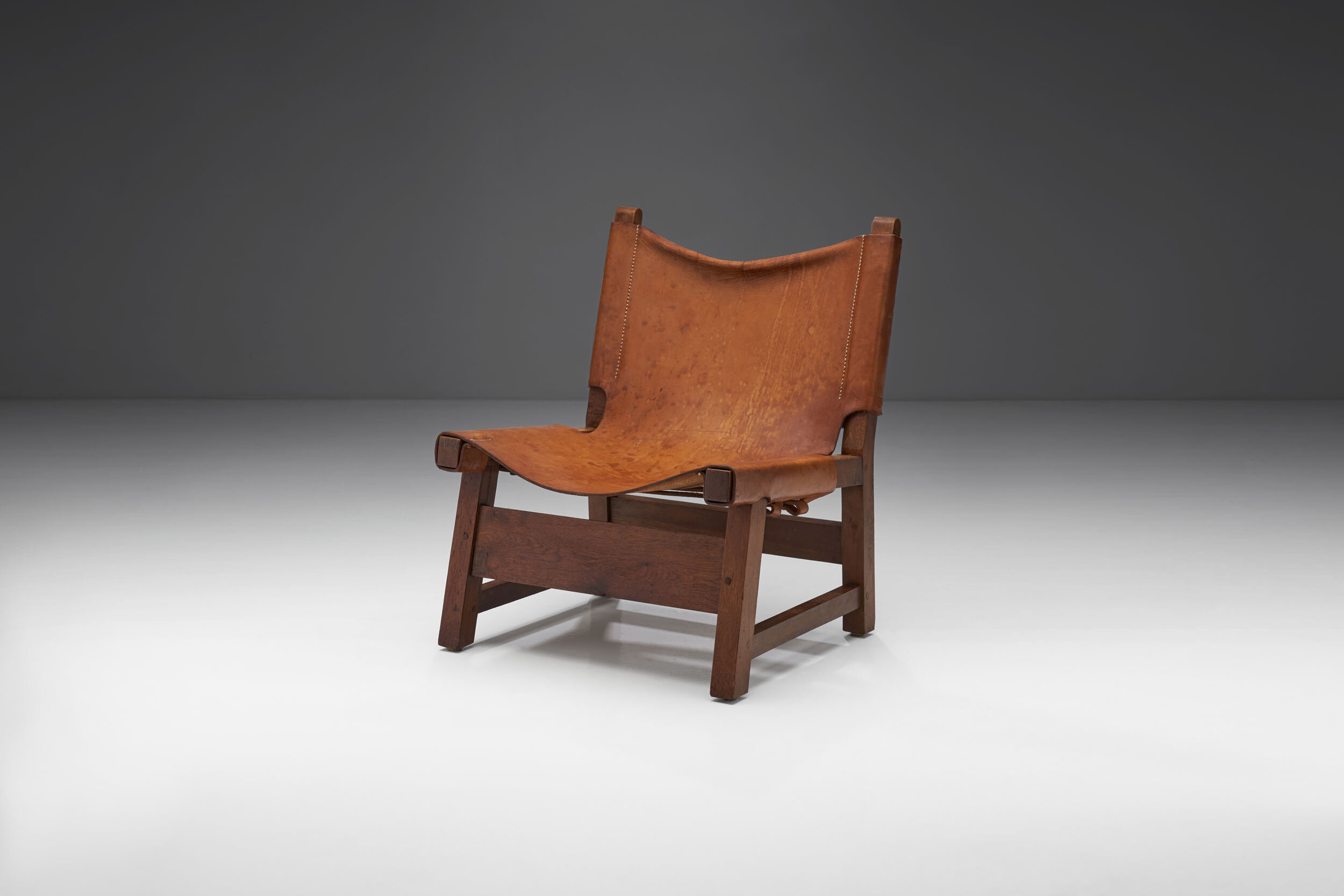 Small Wood and Leather Chair by a European Cabinetmaker, Europe ca 1950s (sold)