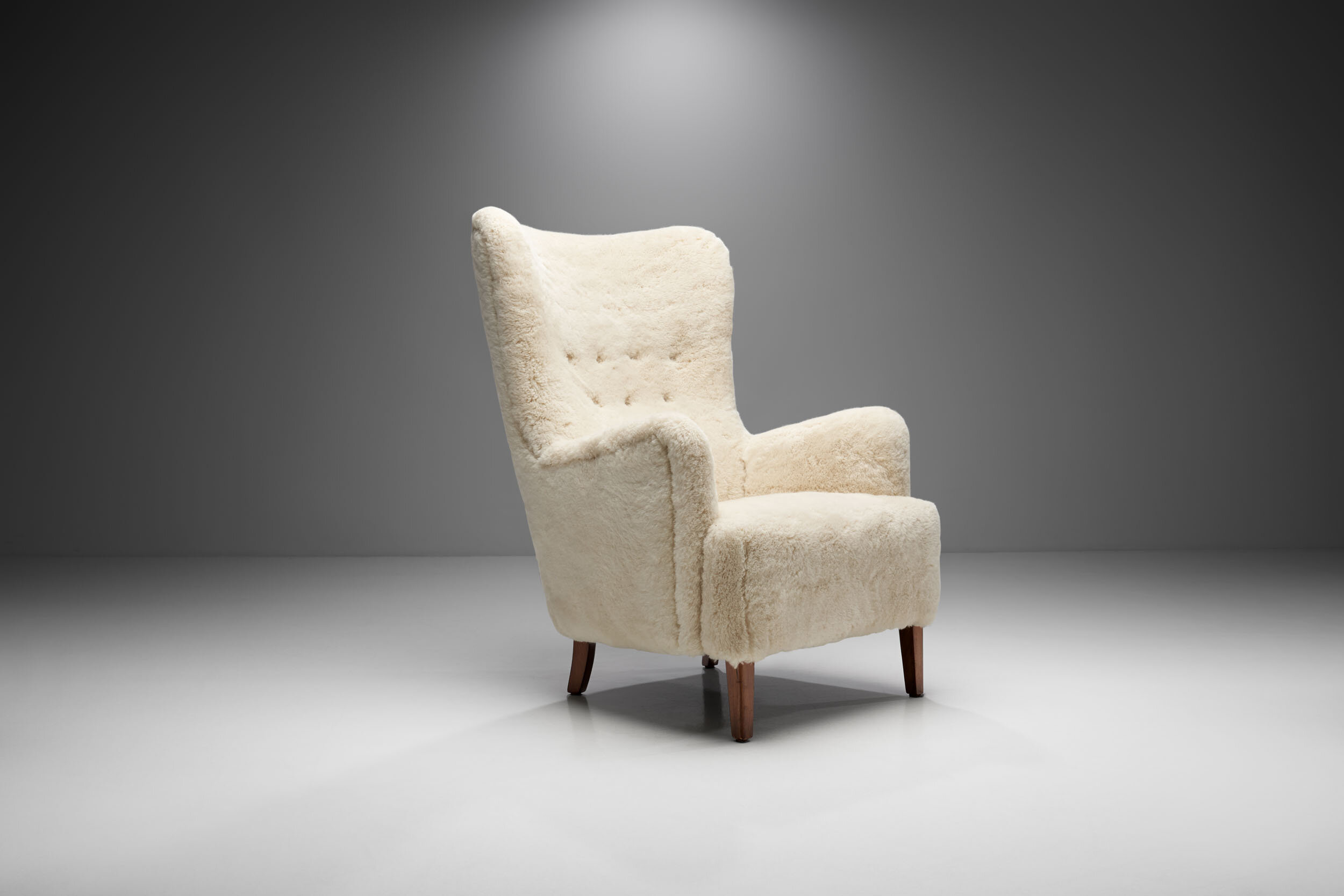 Mid-Century High Back Easy Chair with Stained Beech Legs, Scandinavia 1950s (sold)