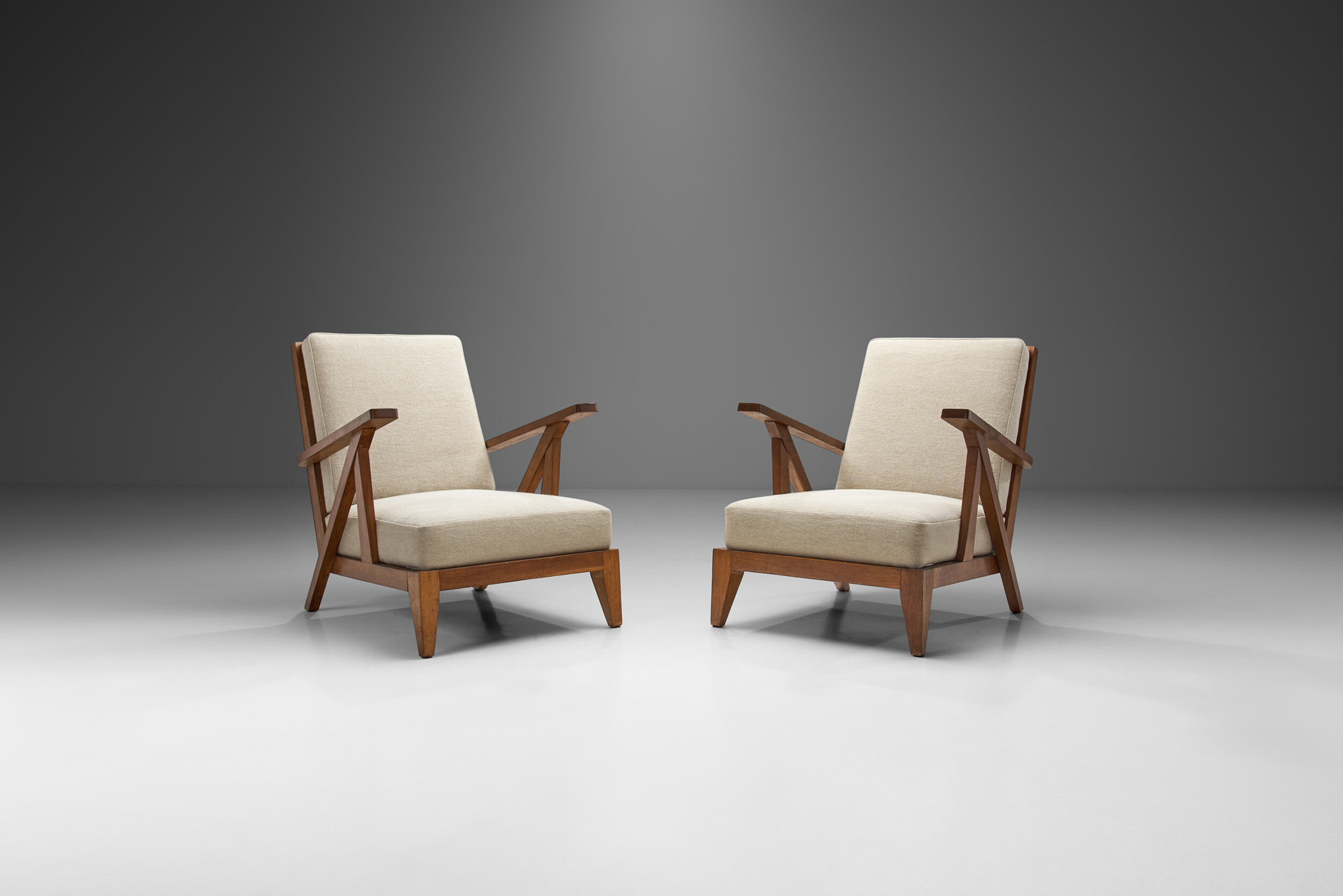 French Reconstructivist Oak Lounge Chairs, France 1950s (sold)