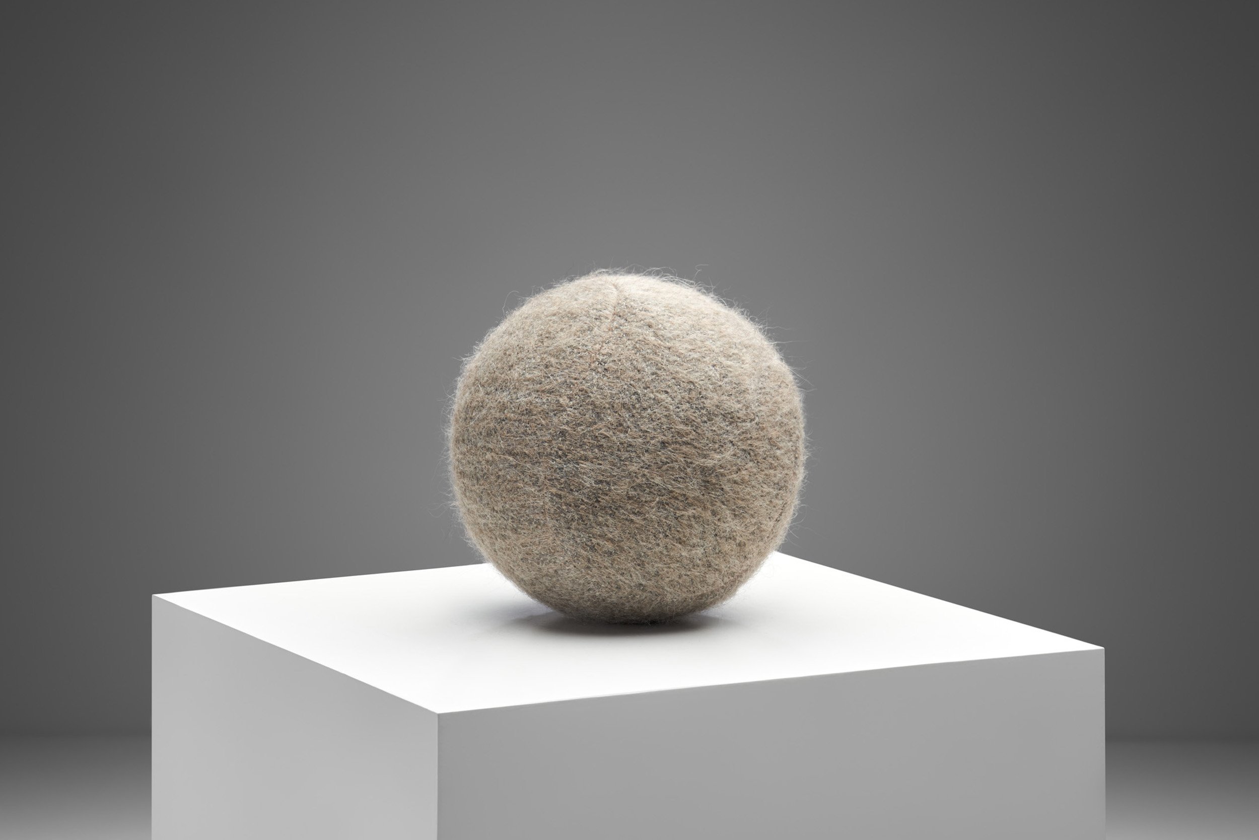 Firm Accent Ball Pillow in Light-Brown Fabric