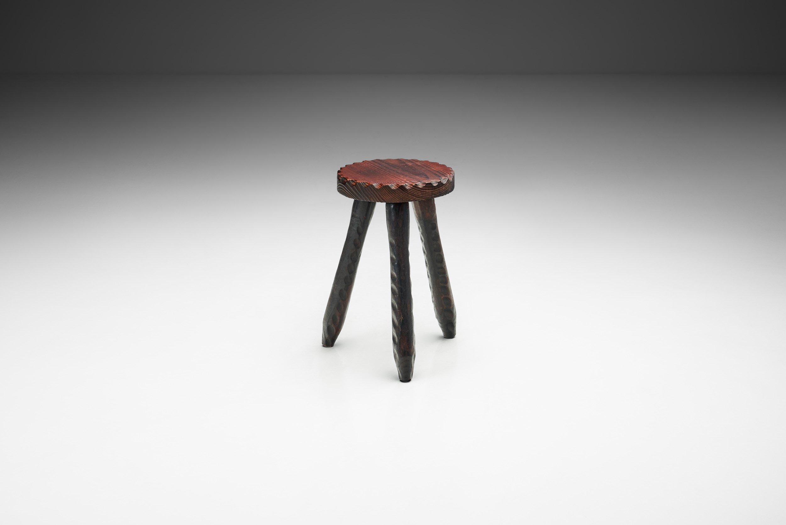 Carved Dark Tripod Stool, Europe ca mid-20th century (sold)