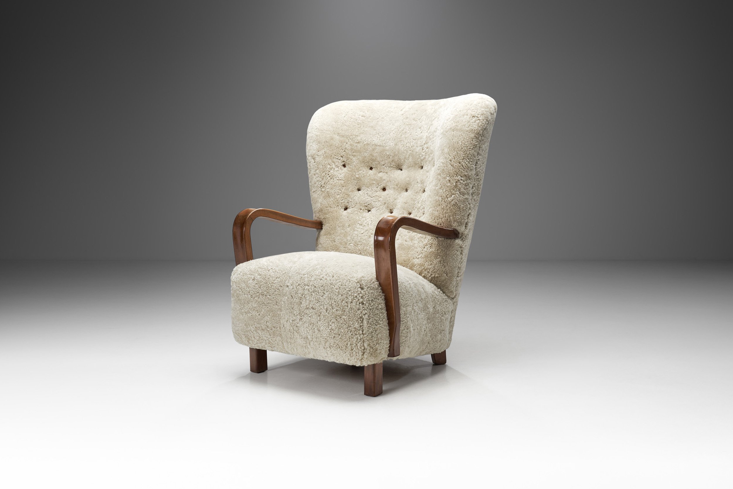 Scandinavian Mahogany Armchair in Sheepskin, Scandinavia ca 1950s (sold)