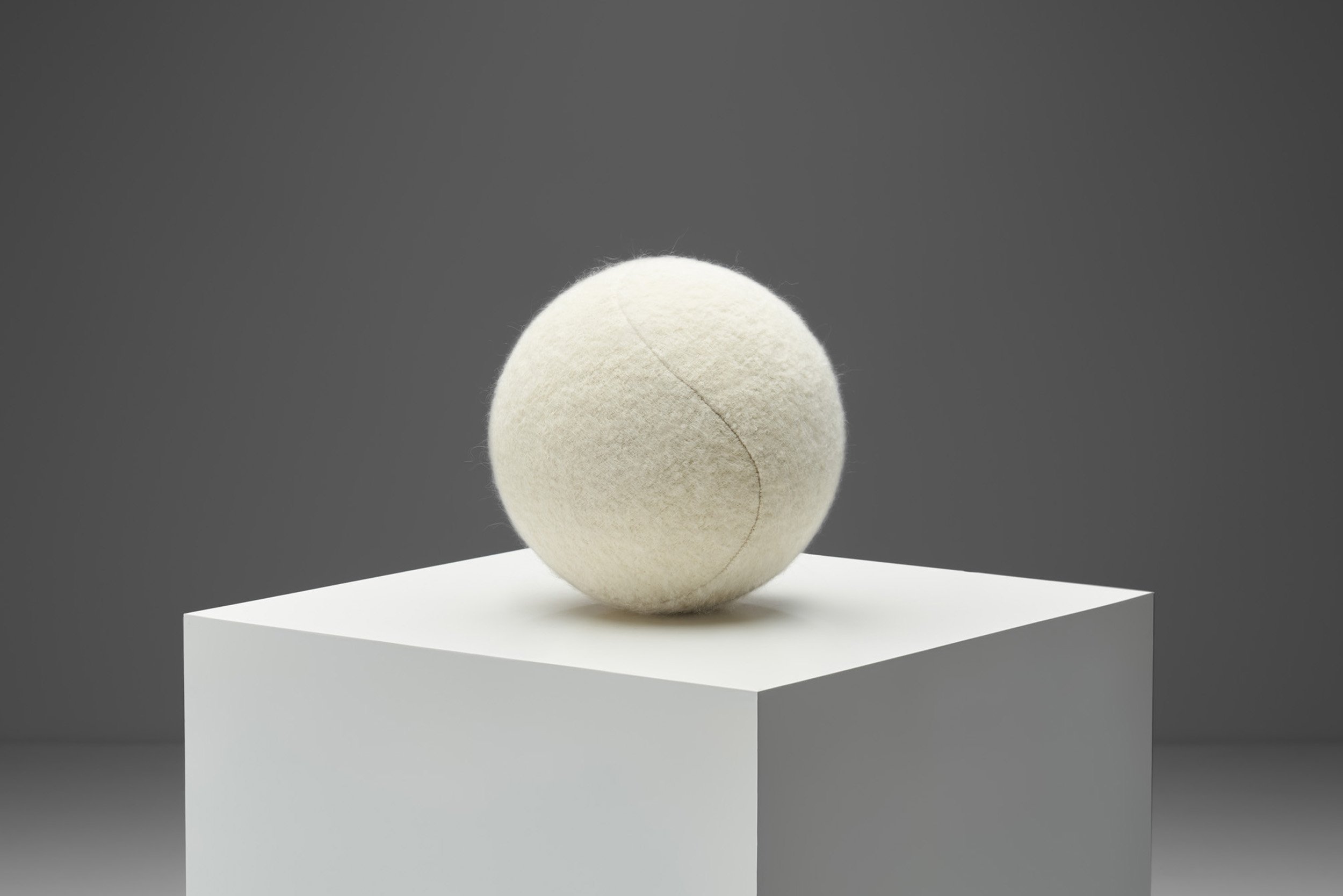 Firm Accent Ball Pillow in Light Coloured Fabric