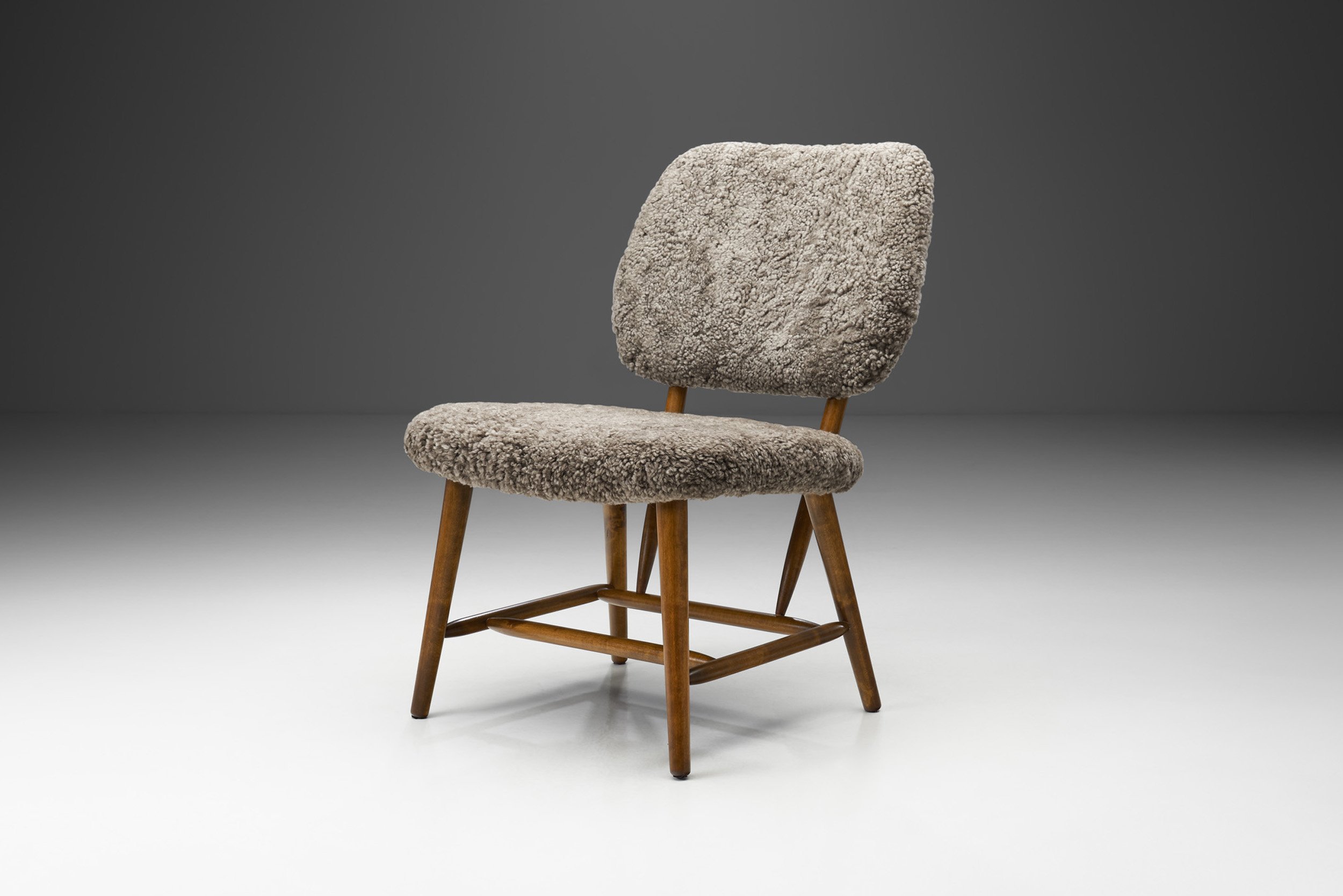 Mid-Century Easy Chair with Dark Sheepskin Upholstery, Sweden 1950s (sold)