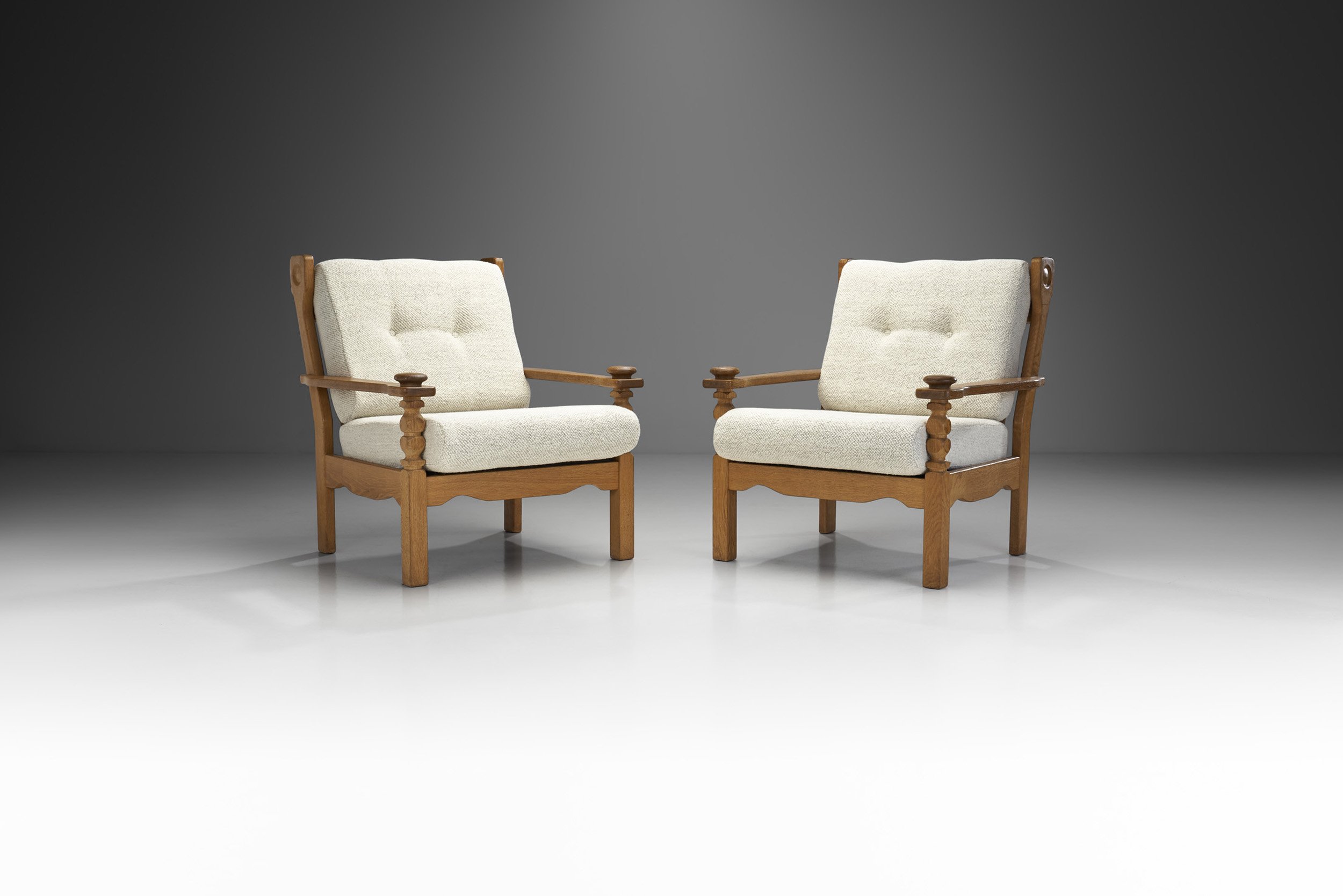 Pair of Danish Oak Easy Chairs with Carved Arm Supports, Denmark ca 1950s (sold)