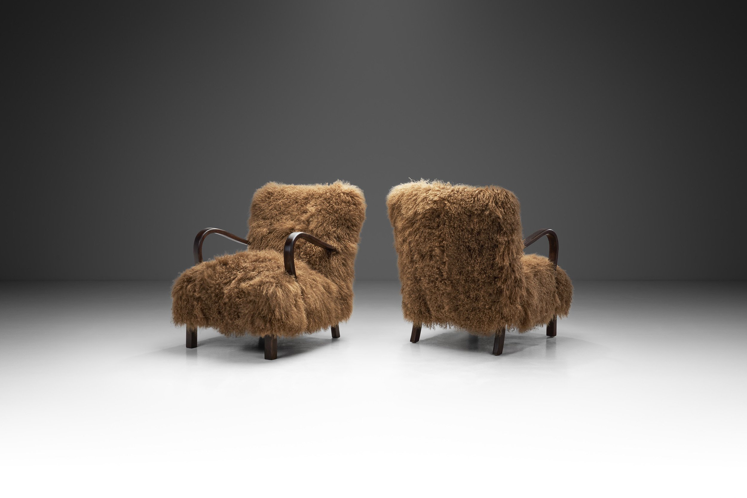 European Lounge Chairs in Tibetan Sheepskin, Europe ca 1950s (sold)