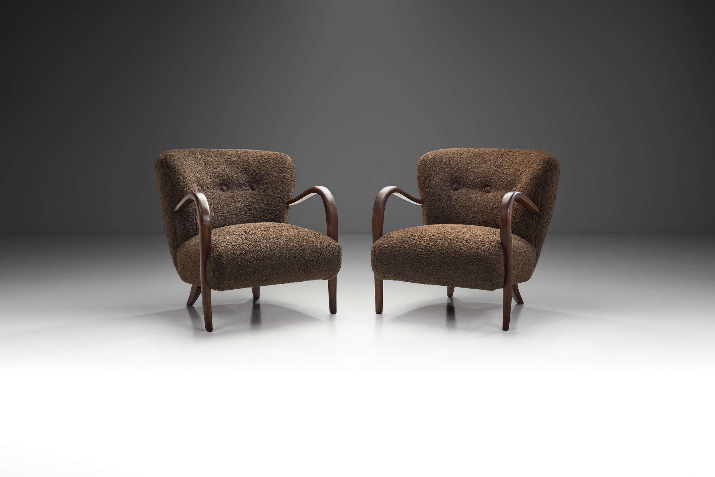 Scandinavian Pair of Armchairs with Sculptural Arms, Scandinavia ca 1940s (sold)