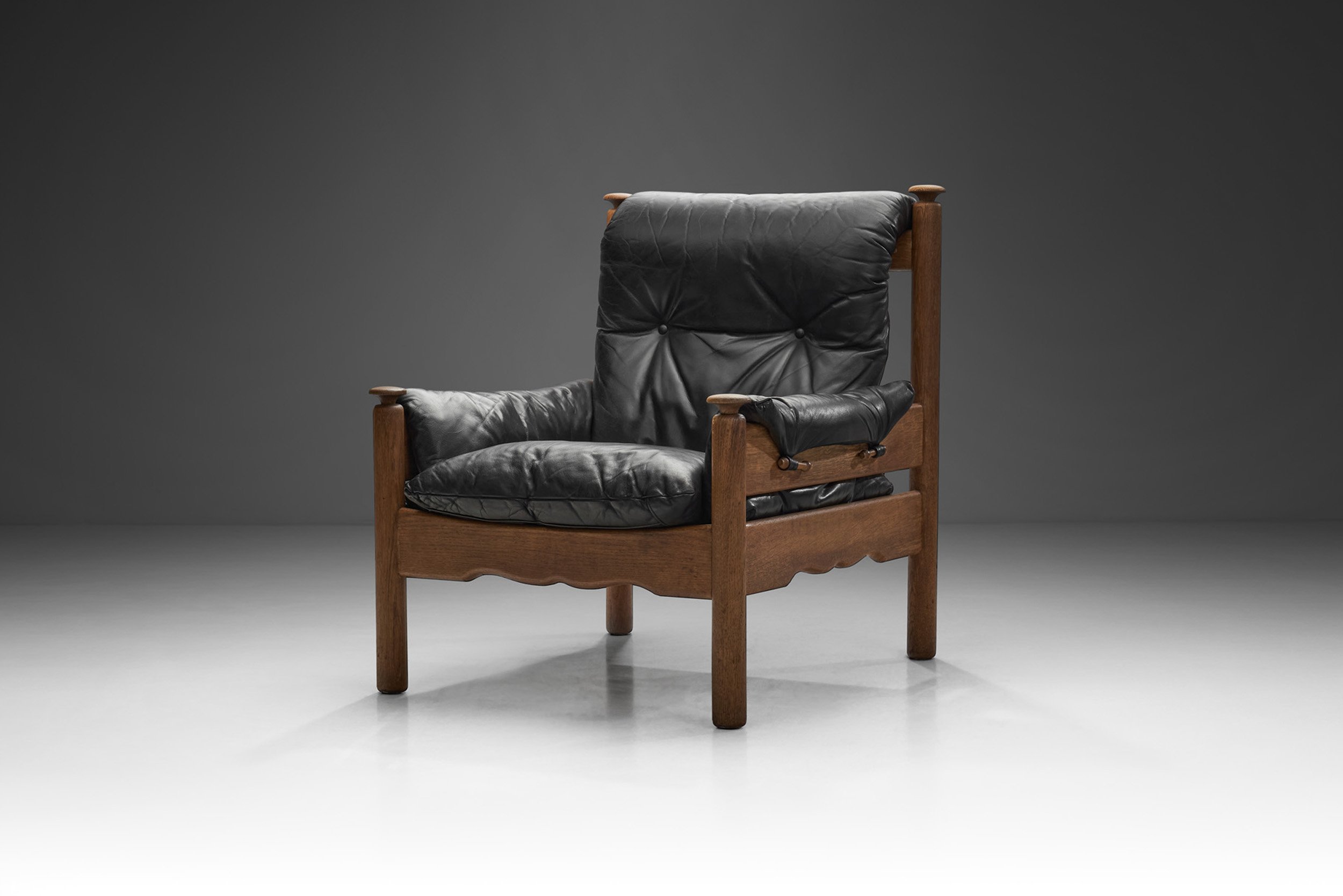 European Cabinetmaker Black Leather and Wood Lounge Chair, Europe ca 1950s (sold)