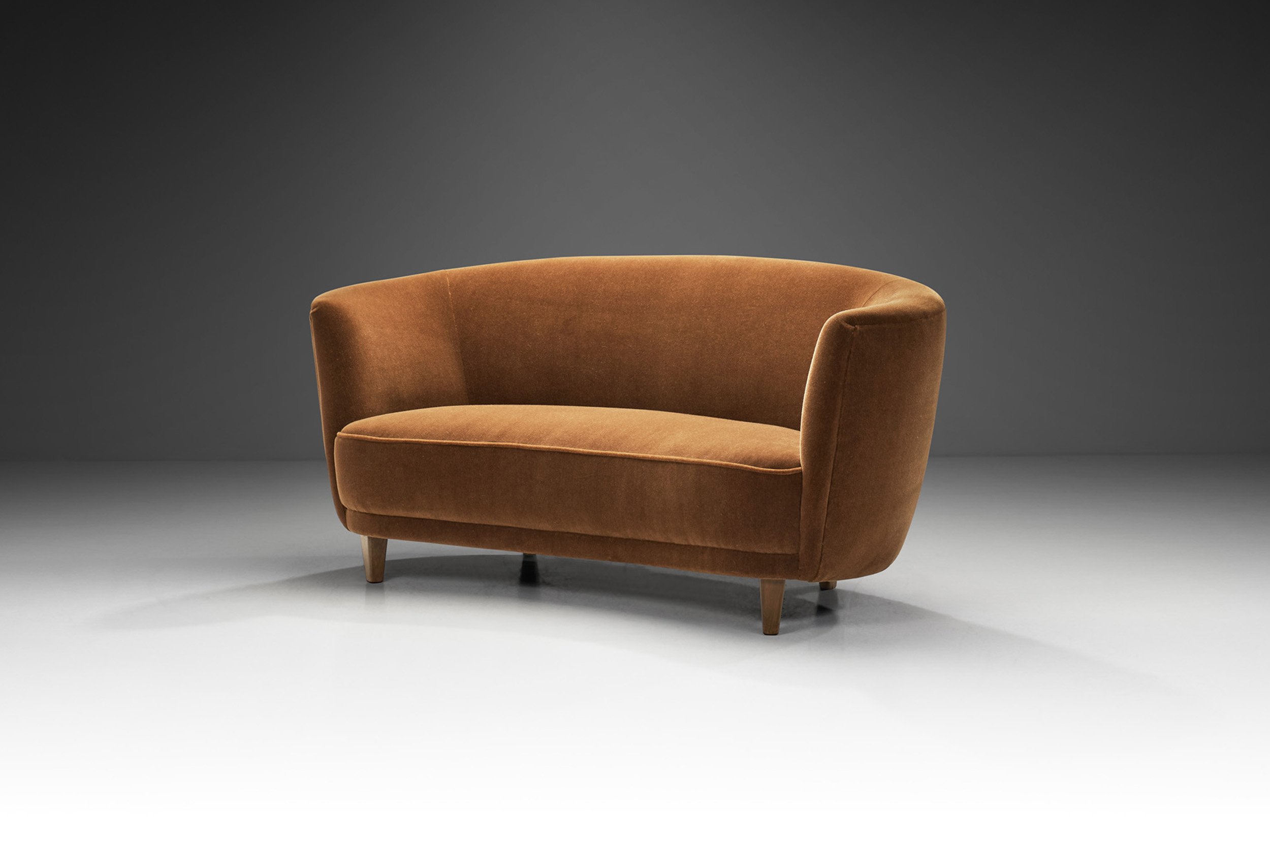 European Upholstered Two-Seater Sofa with Stained Wood Legs, Europe ca 1950s (sold)
