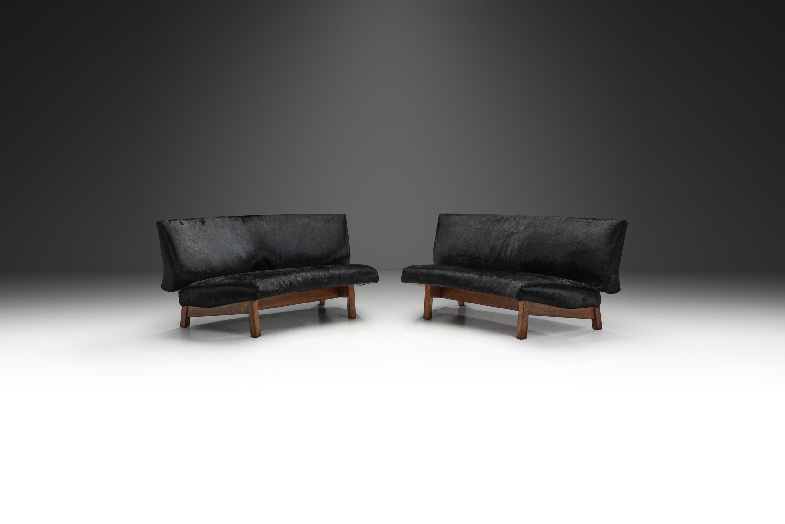 European Mid-Century Two Part Sofa in Black Cow Hide, Europe ca 1950s