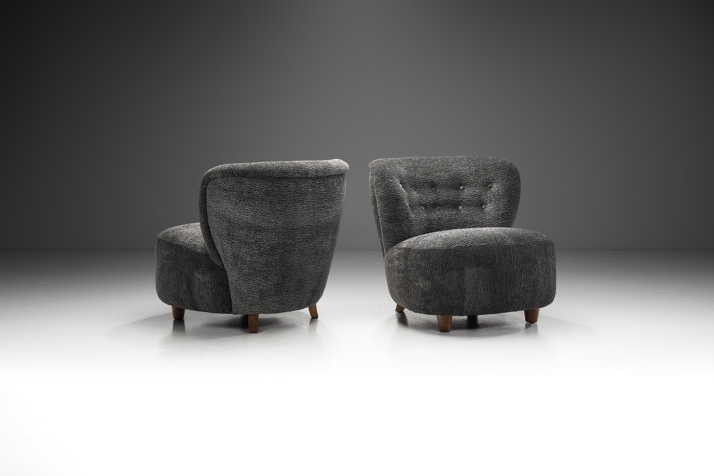 Scandinavian Upholstered Lounge Chairs with Stained Beech Legs, Scandinavia 1940s (sold)