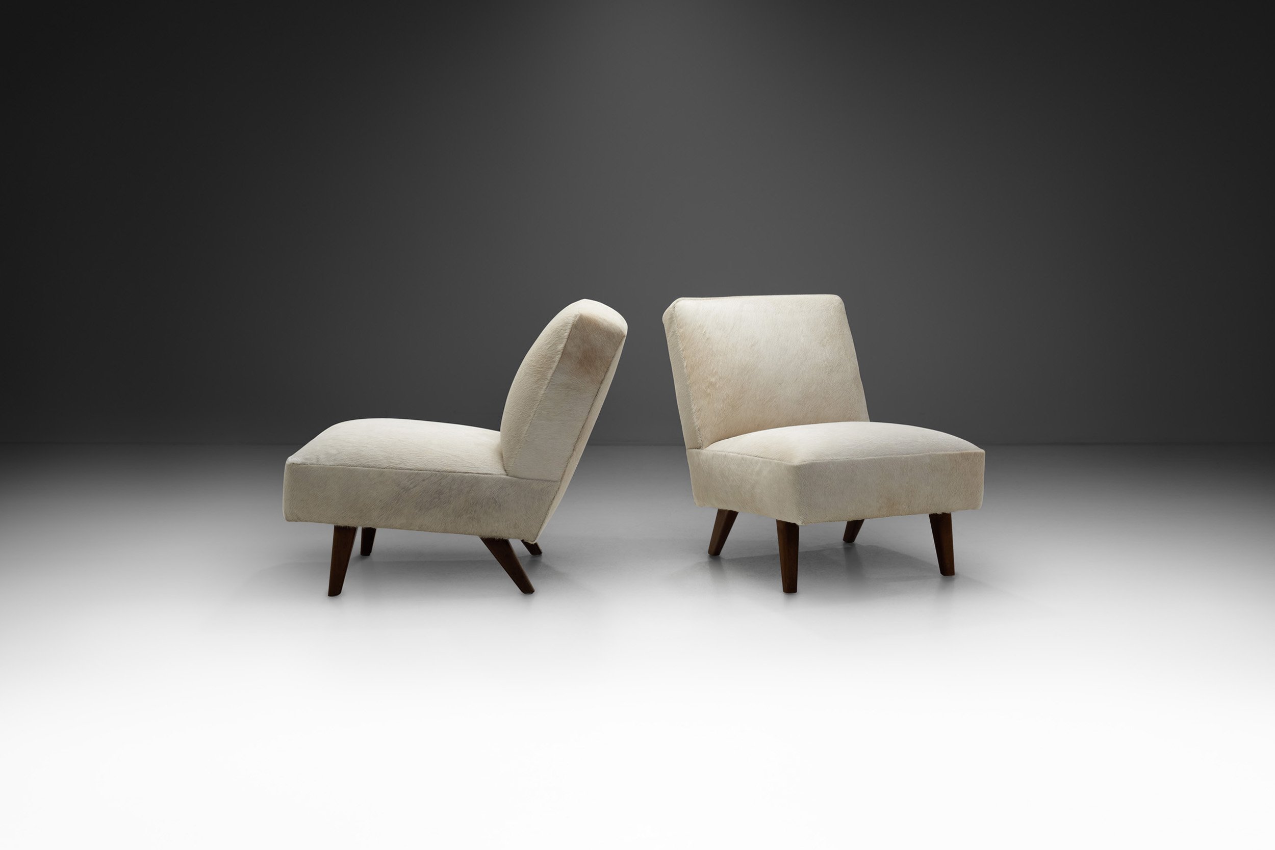 French Mid-Century Lounge Chairs in White Cow Hide, France 1960s (sold)