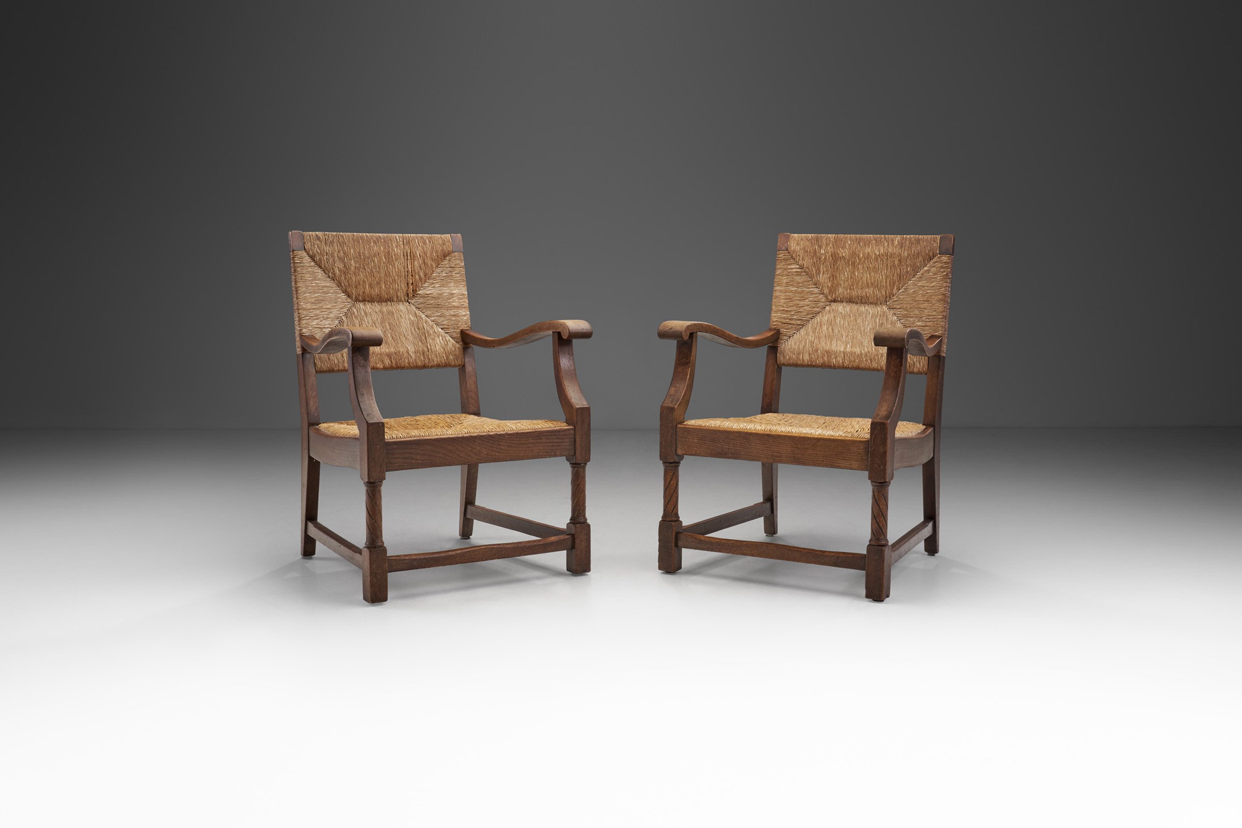 French Sculpted Oak and Paper Cord Armchairs, France 1970s (sold)