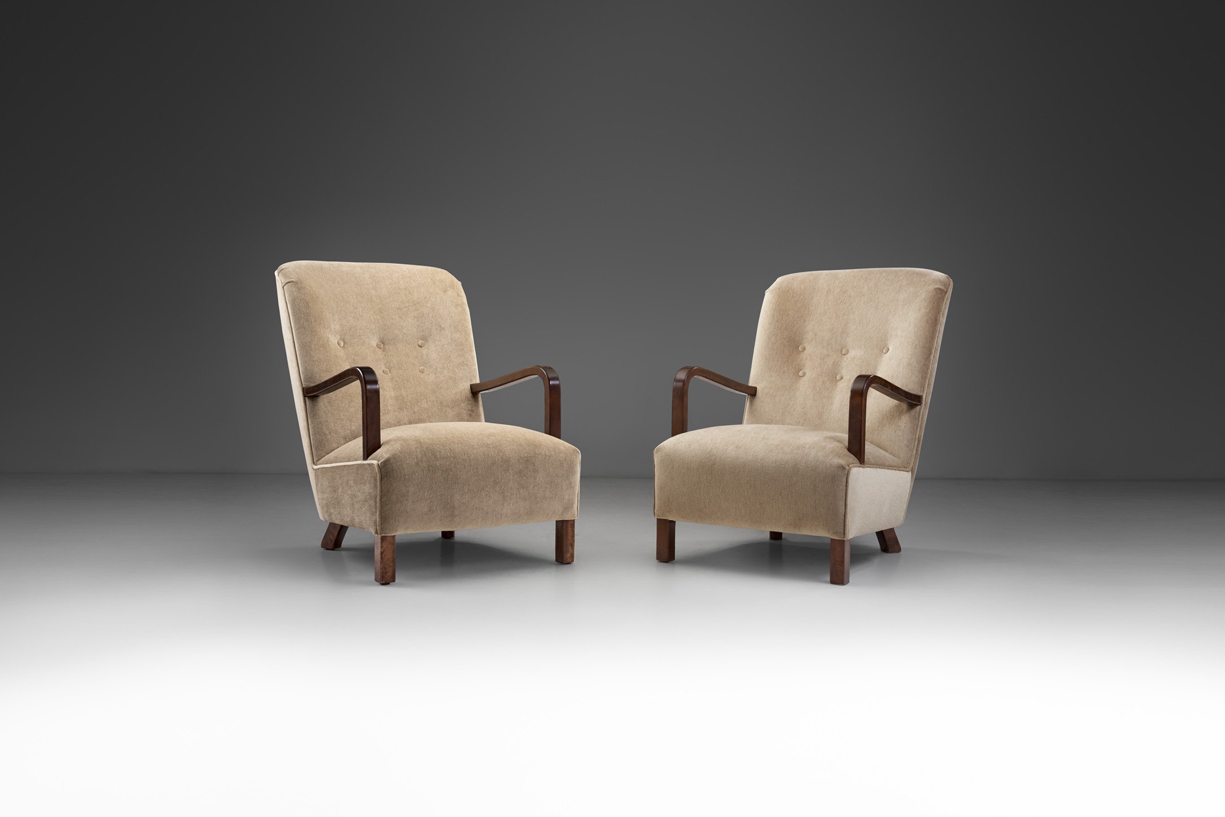 Upholstered Lounge Chairs with Sculptural Arms, Europe ca 1940s