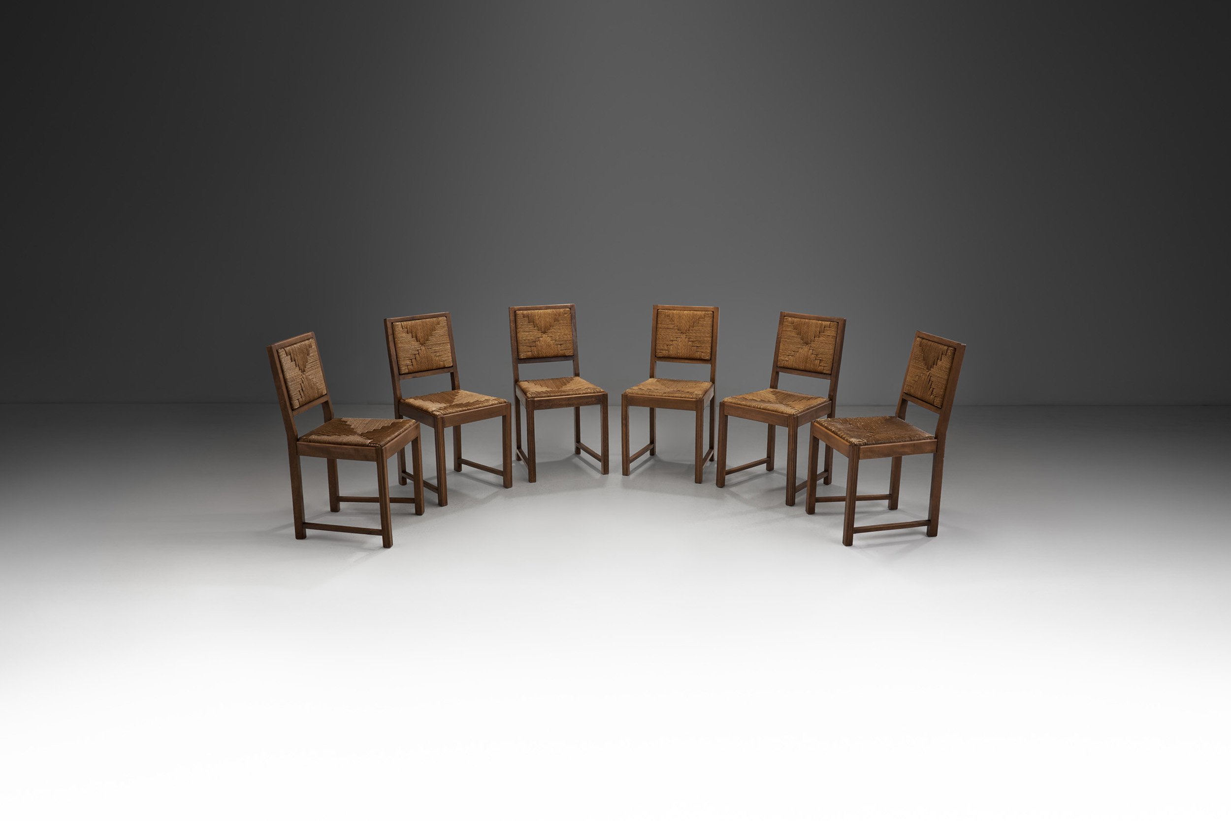 A Set of Six Oak and Rush Dining Chairs, France 1950s