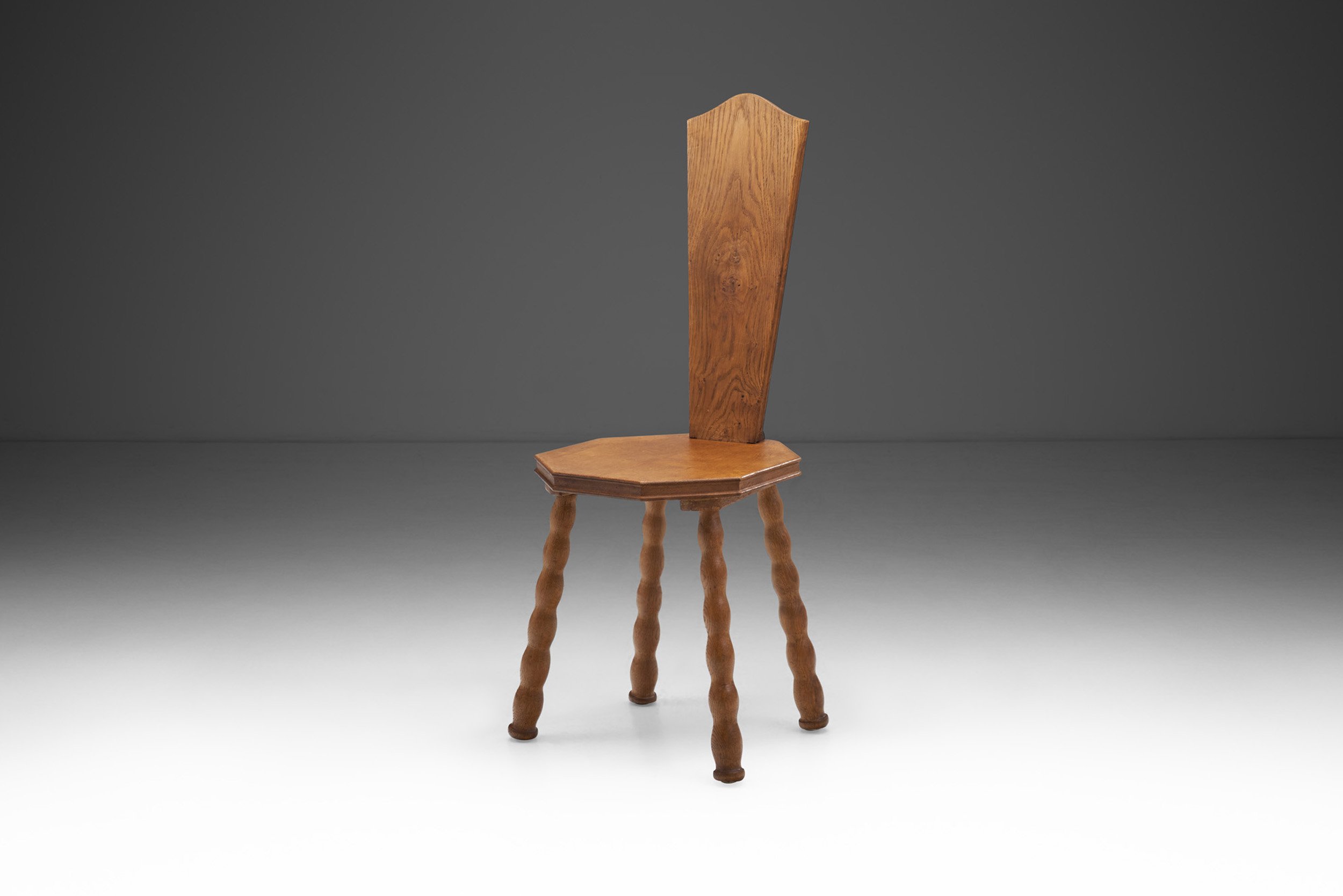 Sculptural Patinated Oak Spinning Chair, Europe ca early 20th century