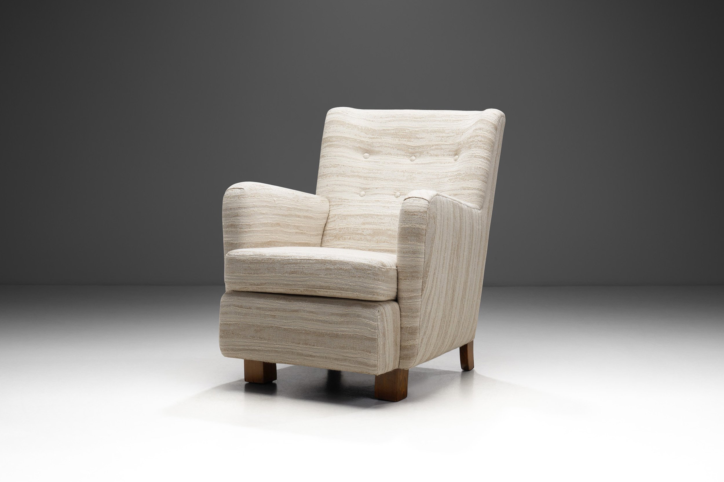 Danish Cabinetmaker Upholstered Armchair with Stained Beech Legs, Denmark ca 1940s