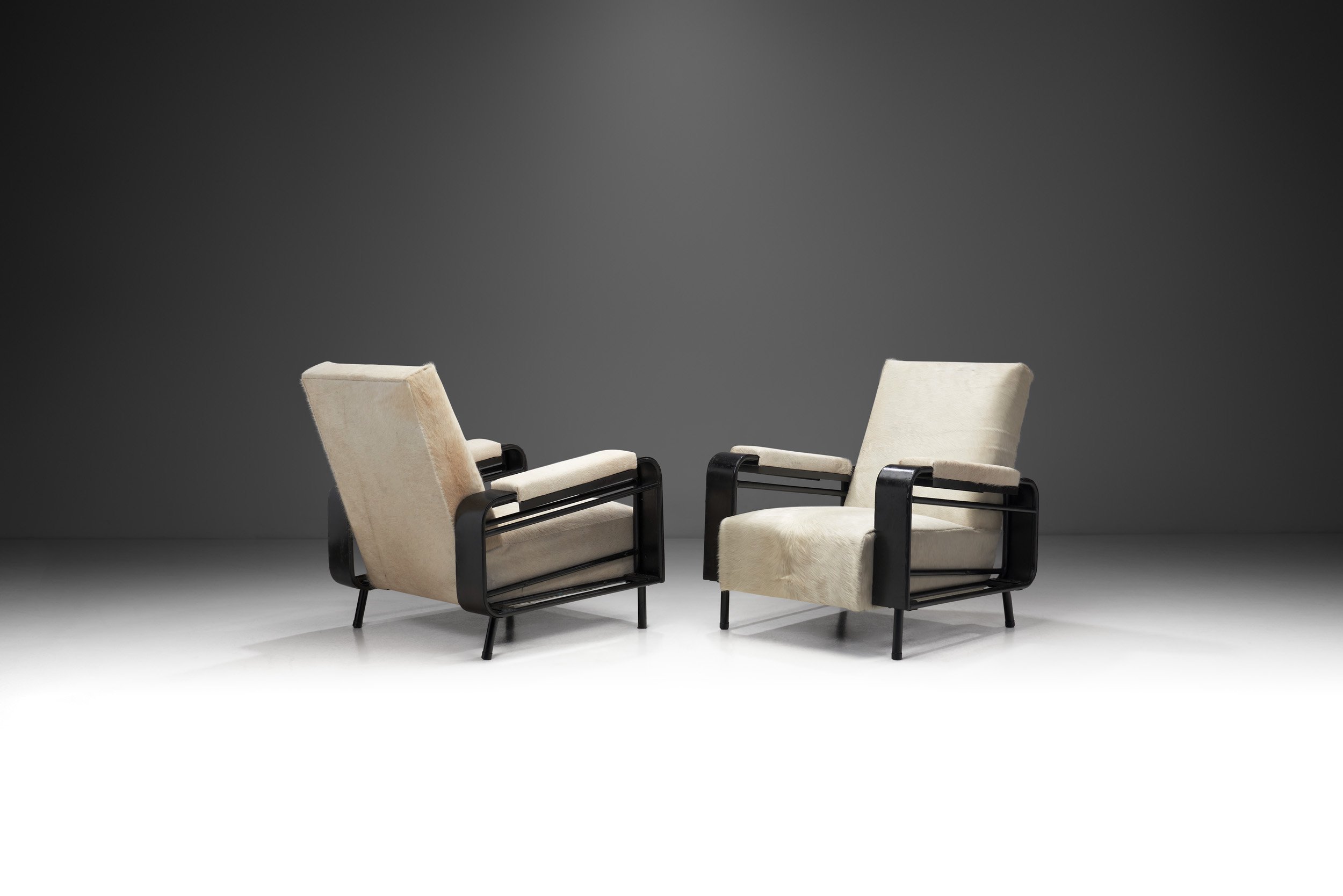 Airborne Metal Lounge Chairs Upholstered in Cow Hide, France ca 1950s (sold)