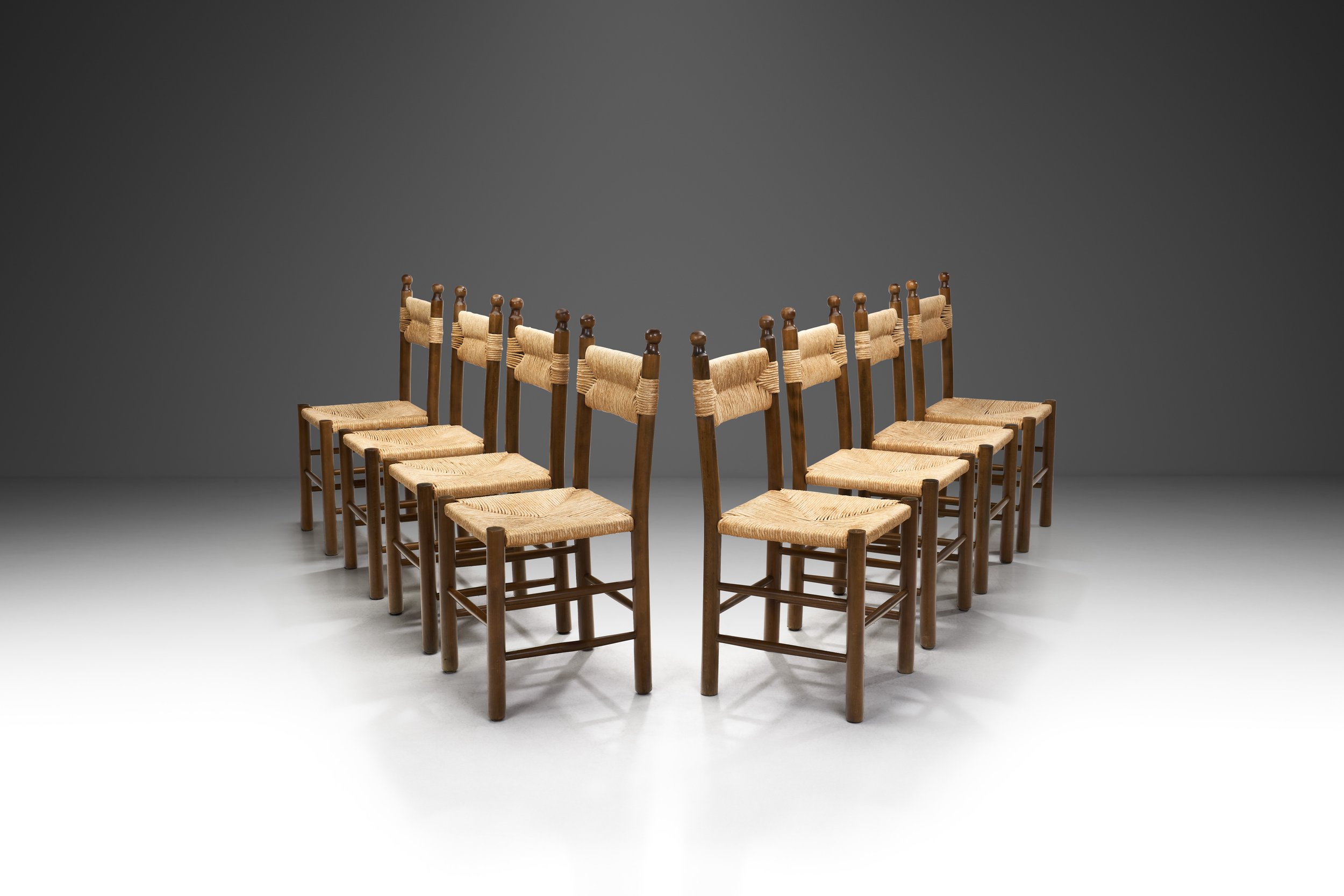 Eight Solid Wood and Straw Dining Chairs, Europe ca 1950s (sold)