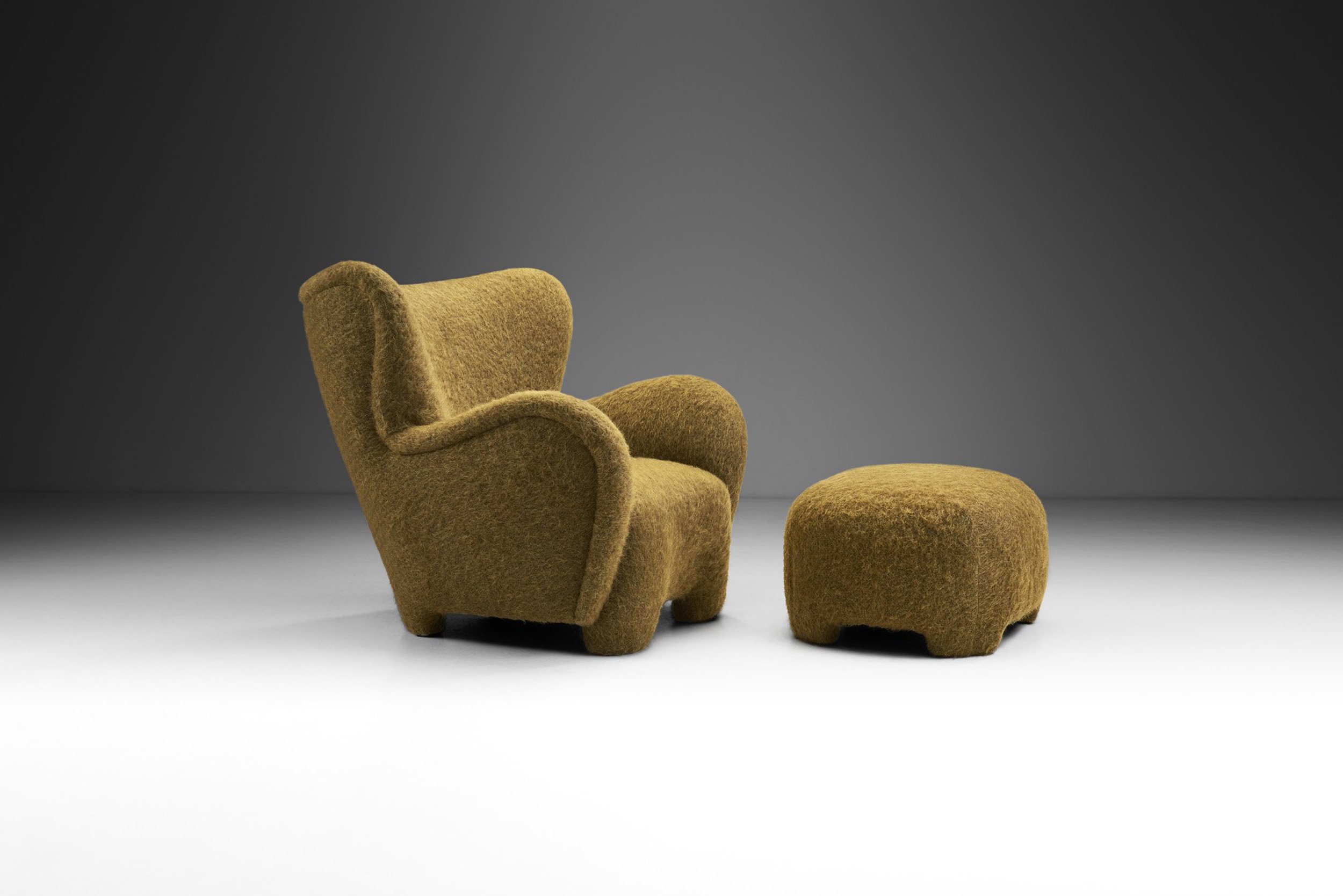Upholstered Finnish Lounge Chair and Ottoman, Finland 1950s (sold)