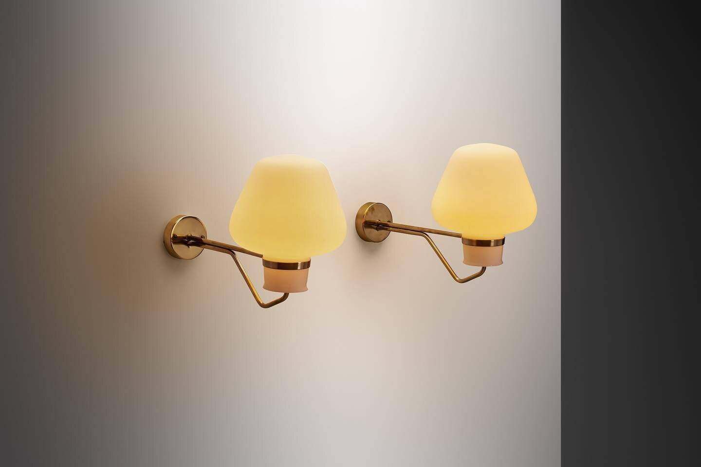 Swedish architect and designer, Erik Gunnar Asplund is celebrated as the godfather of functionalist design in Sweden. Asplund&rsquo;s meticulous attention to detail and penchant for marrying form with function is evident in these wall lamps, combinin