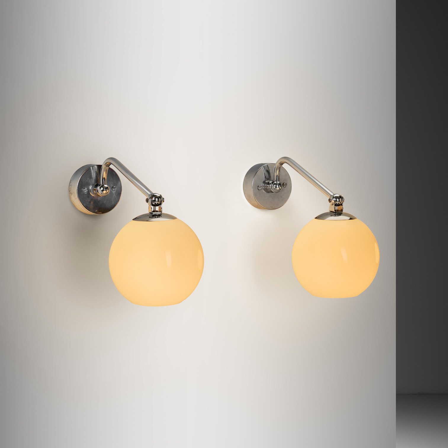 Pair of Nickel-Plated Brass and Opal Glass Wall Lamps by Paavo Tynell for Taito, Finland 1930s
