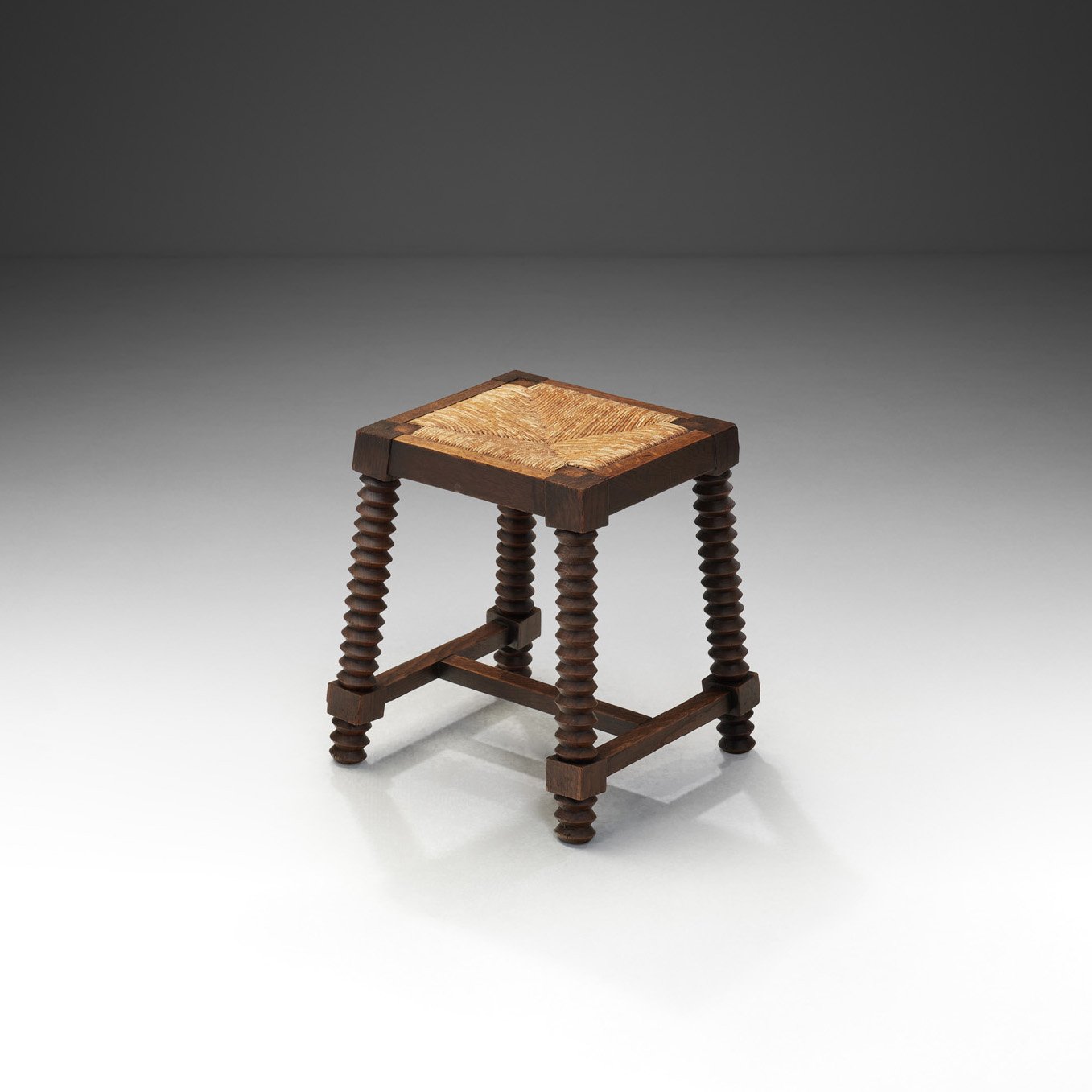Oak and Woven Rush Stool in the manner of Charles Dudouyt, France Early 20th Century (sold)