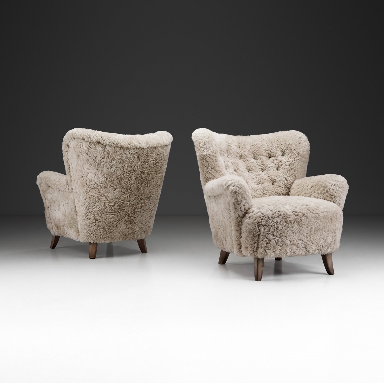 Pair of “Laila” Armchairs in Sheepskin Upholstery by Ilmari Lappalainen (Attr.) for Asko, Finland 1950s