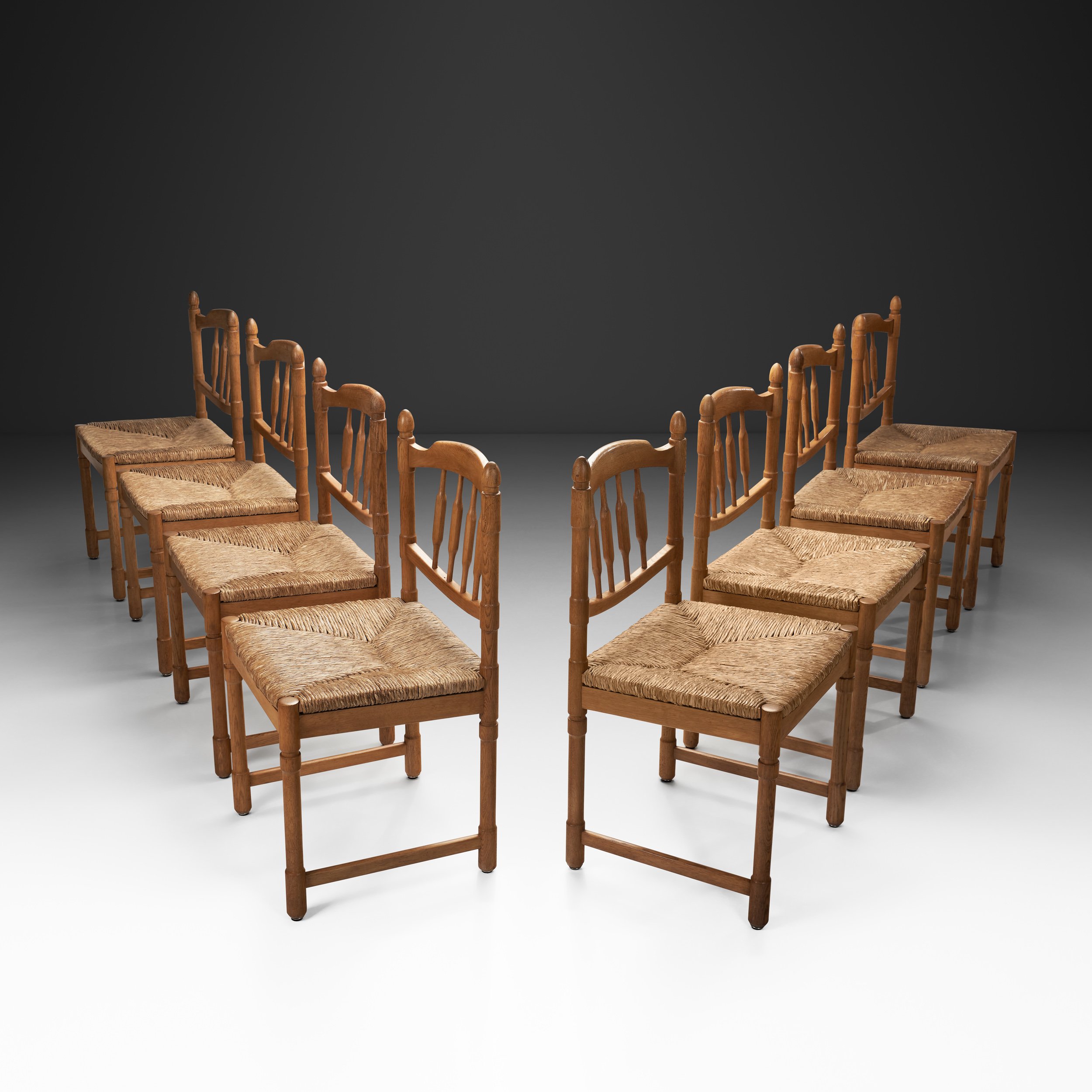 Set of Eight Wood and Wicker Dining Chairs, Europe Mid-20th Century (sold)
