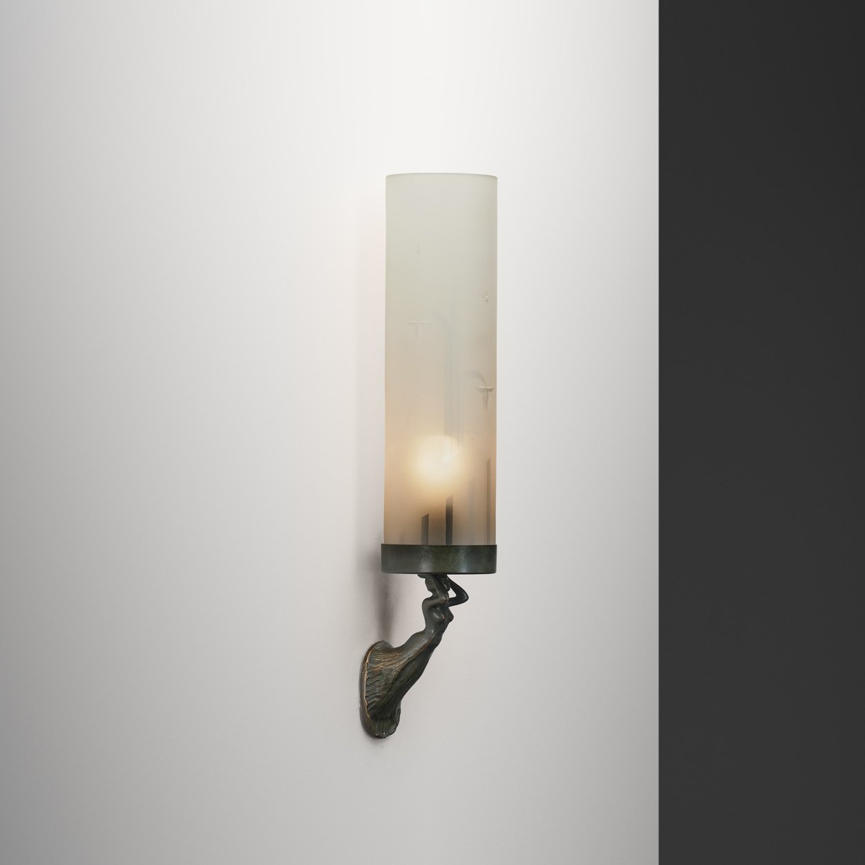 Patinated Bronze Wall Lamp with Frosted Glass Shade and Figural Decoration, Europe First Half of the 20th Century