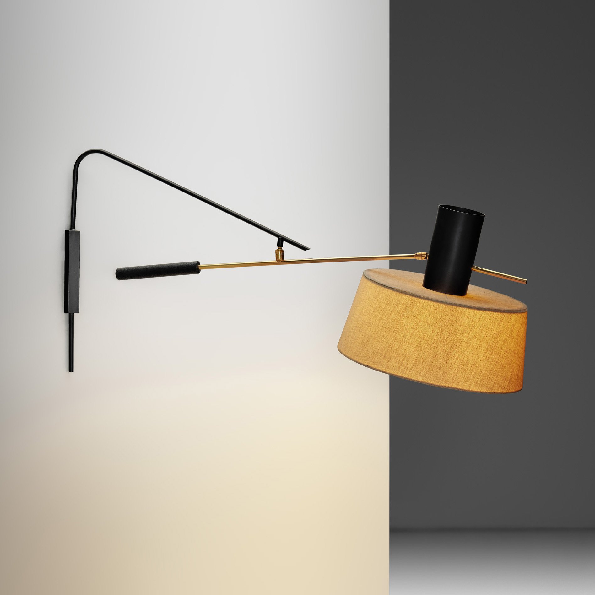 Metal and Brass Wall Lamp in the manner of Maison Lunel, France ca 1960s